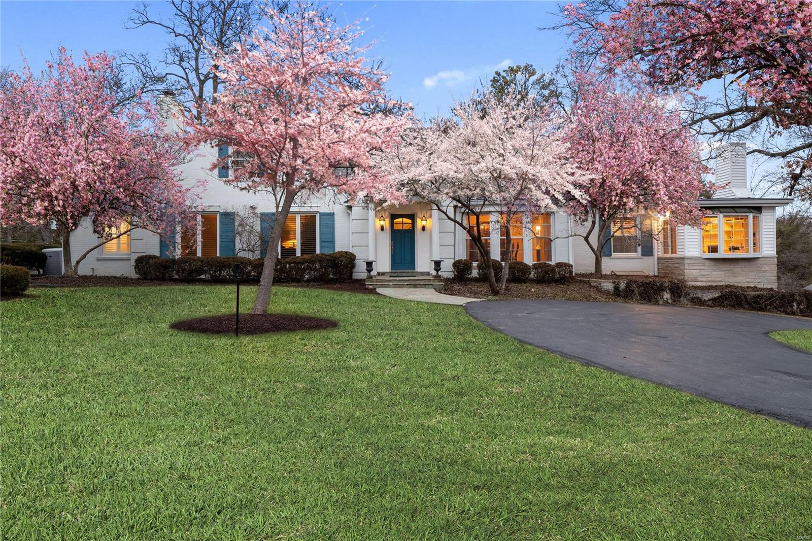 This big, bold & beautiful 1940s home presents a labyrinth of lifestyle options. Nestled in an exclusive suburb/school zone and offering 4000sqft+ of floor space and a large, leafy lot, there’s room for entertaining, relaxing, exercise and enterprise. A teardrop driveway leads to a grand entryway with an inviting foyer. A classic staircase links the 3 levels. Highlights: ultra-modern kitchen with high-end appliances, heated tile flooring, banquette seating & sliding doors that open to the expansive deck and park-like grounds; behold 2 massive living rooms + fireplaces - the main basking in natural light showcases custom bookcases and a bay window. The divine main floor primary bedroom features a dressing room large enough for the cast of Hamilton, while its ensuite boasts a superb soaking tub. Upstairs, the charming loft with high ceilings & skylights contains the extra bedrooms. Bonuses include a tuck-under 2-car garage and a basement with options for a gym, theater room or storage.