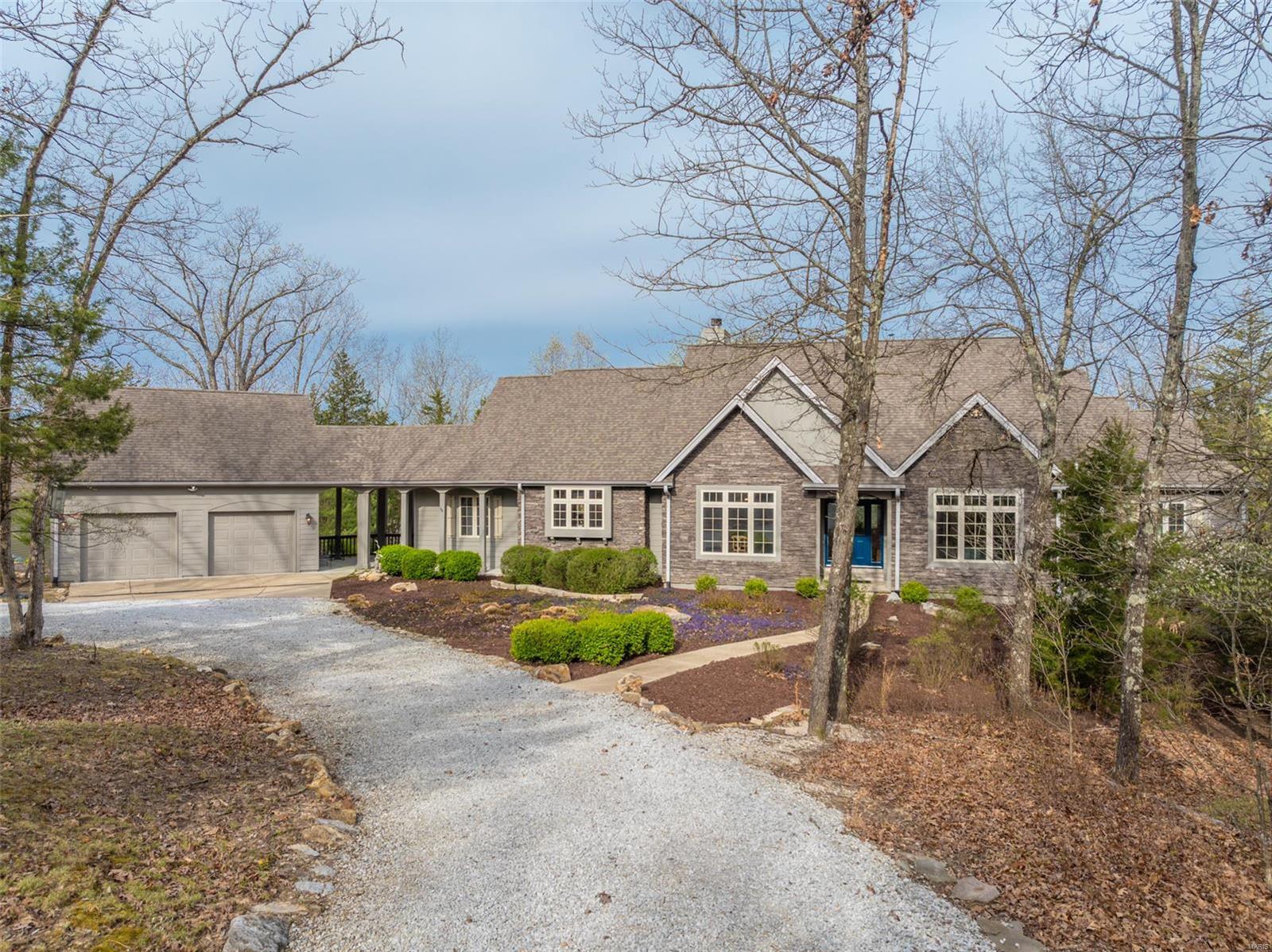 LAKE KONSTANZ!! this amazing custom designed home offers luxurious lakeside living at its finest. Featuring ML wood floors, spacious great room with plenty of windows to take in the views, private dining room with butlers pantry, hearth room with gas fireplace and is open to a custom kitchen w/ island counter. Offering 5 bedrooms, this spacious home offers plenty of room for entertaining family and friends. ML master bedroom suite with guest bedroom/bath, additional 3 bedrooms down along with a great room/game room with all the games, built in wine cooler, entertainment/Media room with custom recliners, surround sound and wet bar, perfect for relaxing at the end of the day. The expanded deck offers plenty of outdoor recreation venues. The home has been professionally landscaped for minimal upkeep w/ babbling brook, lakeside dock, beach area and fire pit area just steps away from home.2 car garage. Includes pontoon boat and golf cart along w/ some of the furniture. New HVAC and HWH 2021 Suitable for Bed/Brk
