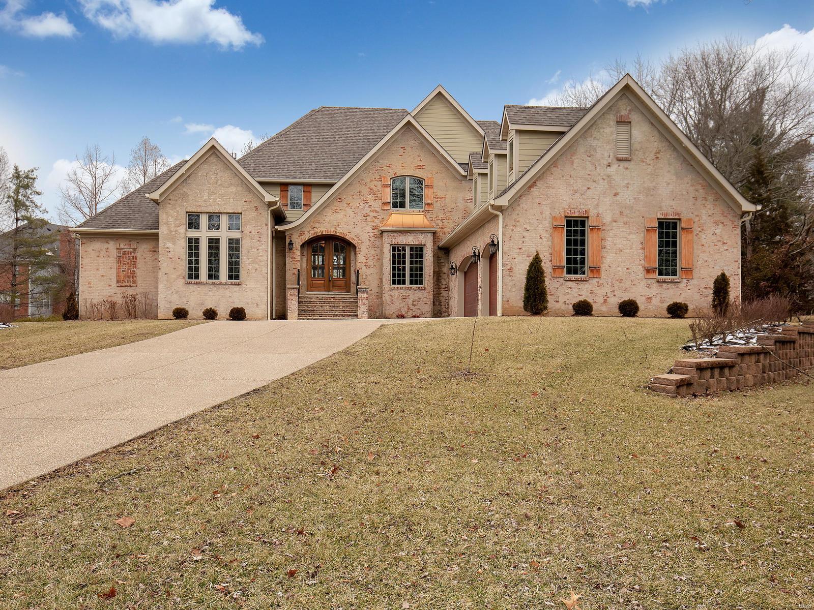 This Stately Home with handsome curb appeal is located in the sought after Bellecoeur Neighborhood!  This exceptional home features meticulously crafted and modern amenities, yet create a soothing ambiance of welcome and warmth!  This Luxury Home impresses at every turn!  Only 3.5 years old, you'll be "Wowed" with the architectural detailing found throughout, including stone walls, built-in book shelves, coffered ceilings with wood inlays, handscraped hardwood floors, and so much more!  Every feature was well-planned!  The stellar kitchen is fit for a master chef!  The Master Bedroom Retreat is complete with a sitting area, gas fireplace, Luxurious Master Bathroom, and so much more! This exquisite home sits on a beautiful, level, private .87 acre lot overlooking the salt-water pool. Boasting 5 spacious bedrooms, each with their own appointed bathroom.  5 gas fireplaces. The partially finished, walk-out lower level completes this incredible 5,274 sq. ft. home!
