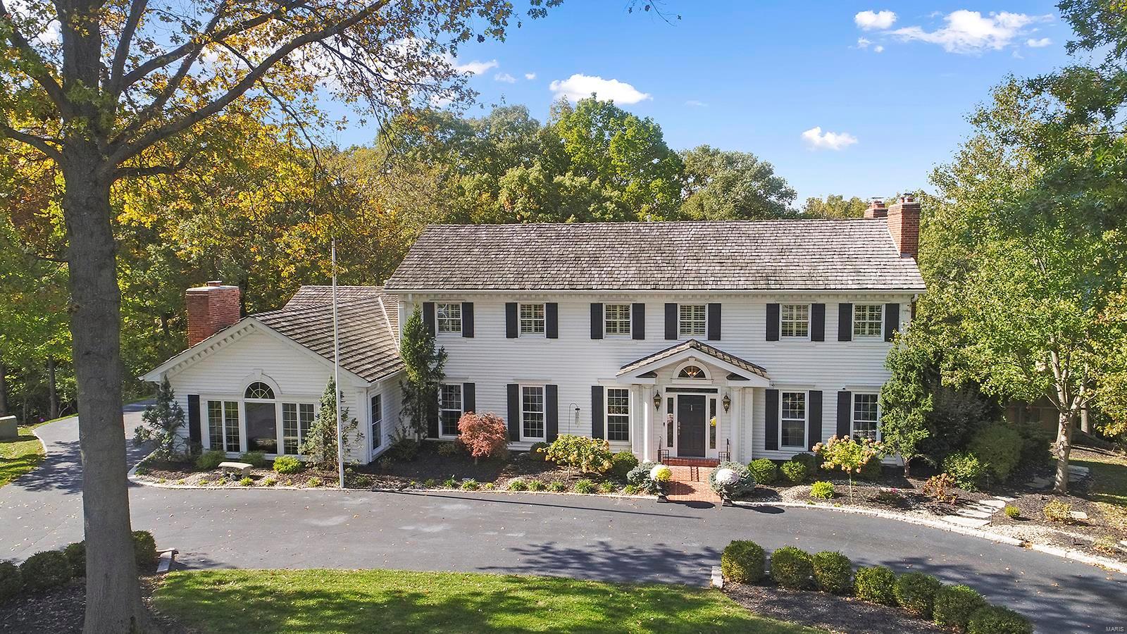 Spectacular 5 Bdm, 5.5 Bath, custom built home on the grounds of Forest Hills Country Club backing to the 13th & 14th hole of the golf course. This private 2.2-acre retreat is tucked away on quiet cul-de-sac, has been updated & freshly painted throughout (2020-2021), by its’ current owner, making this home truly move-in ready. Highlights: totally updated (2020) gourmet chef’s Kitchen with beautiful Cambria Quartz (Fairborne) countertops, large center island w/ breakfast bar, custom cabinetry, and top of the line ss appliances; Great Rm w/ custom stone gas fireplace, custom built-in cabinets, & custom wetbar with Sub-Zero beverage center, spacious Master Retreat with a gorgeous luxury Bath, with custom cabinetry, granite counters, stand-alone walk-in shower; incredible professionally finished, walk out Lower Level. Perfect home for entertaining! Fully fenced backyard boasts a gorgeous in-ground pool, outdoor kitchen & gas fireplace, bar area! Additional Rooms: Wine Cellar