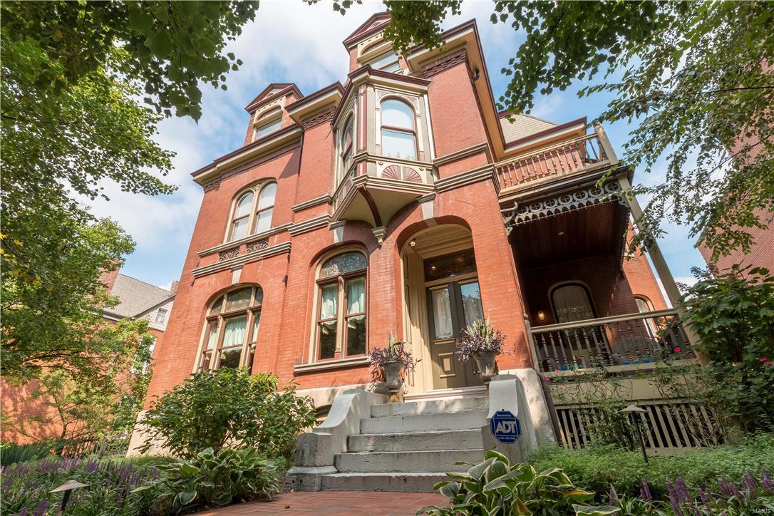 Built in 1884 by a Civil War Major named Leo Rassieur, this Victorian Manse in Lafayette Square combines both elegance and comfort with crisp historic details throughout. Stunning renovations married to the pinnacle of Old World architecture have produced a remarkable and move-in ready residence. This is a unique opportunity to purchase 3 structures for 1 price (Manse, 2-story Carriage House, & Garage). The Residence is gracious with a casual elegance, wide open spaces, and sits on magnificently landscaped grounds. The large chef-friendly kitchen features high-end appliances and spectacular granite plus a butler's pantry with powder room. The Master Suite offers a copious amount of closets & storage, heated bathroom floors and a luxurious soaking tub. All new systems installed during renovation, 2-car garage, 2nd floor laundry, meticulously maintained. Lafayette Square Park & great restaurants are steps from the front door. Enjoy one of STL's finest communities in an exceptional home.