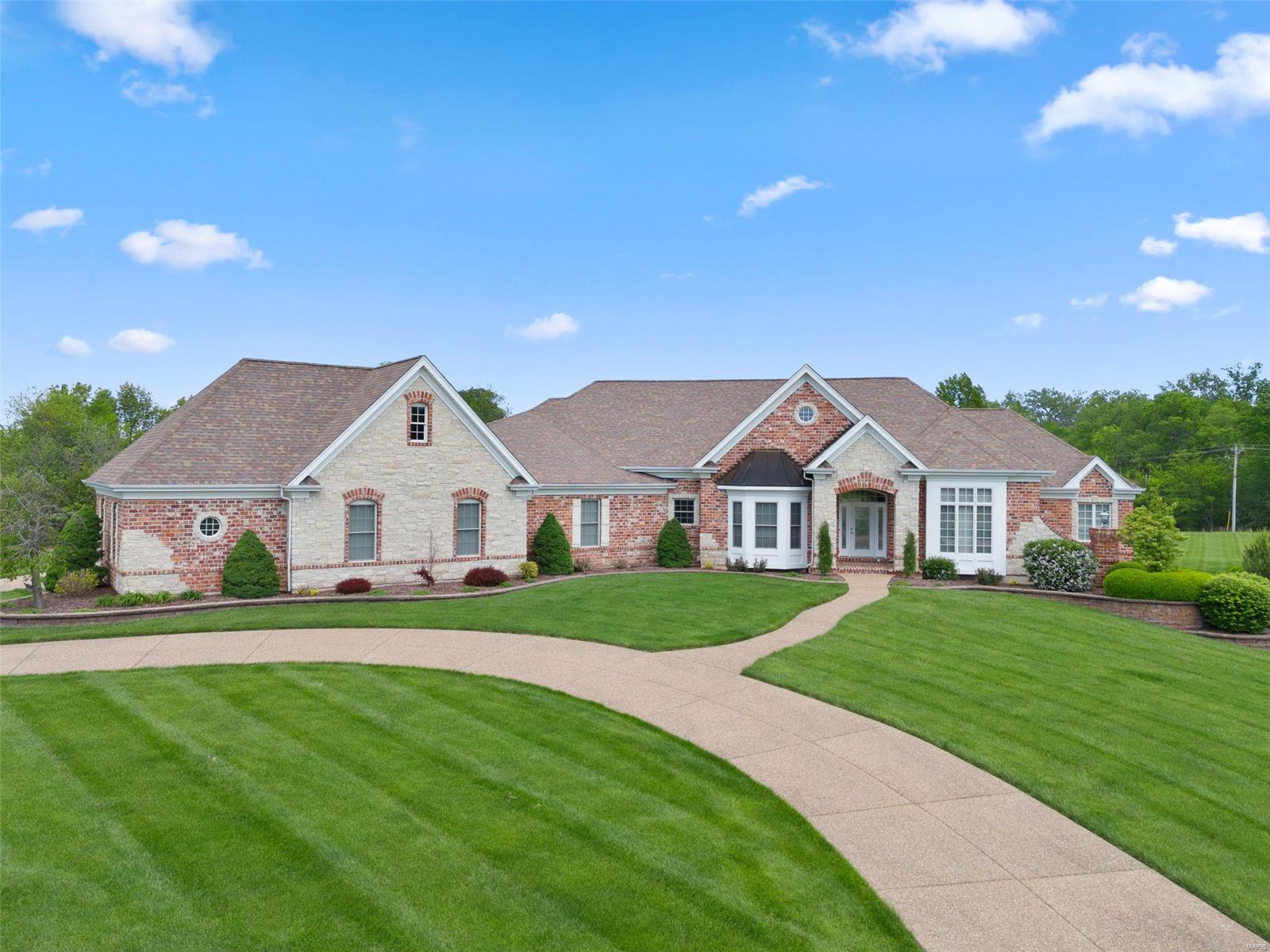 Live a life of luxury and seclusion with this ranch home in prestigious Lynchburg Estates. This stately atrium ranch sits on a peaceful 3 acres & boasts more noteworthy features than you can imagine! 5 bedrooms & 4.5 baths throughout this sprawling 6,558 finished living sq footage. With a cozy hearth room, media room, rec room w/bar, fitness/spa room, wine cellar, and private inground pool, there is an area to please just about everyone! Spacious main floor master w/elegant en suite bathroom adjacent to the office with custom built in bookcases. Updated features include (2022) new ACs/furnaces , bathroom remodel, (2023) water softener, composite deck/stairs, wrought iron hand rail, outdoor awning with weather sensor, (2022-2023) pool motor, sand filter, pool vacuum, front door w/sidelights, and new blinds including electric on atrium windows and master bath. Garage is heated/cooled with epoxy floors perfect for the car enthusiast/hobbyist. This is a property you won't want to miss! Additional Rooms: Mud Room, Wine Cellar