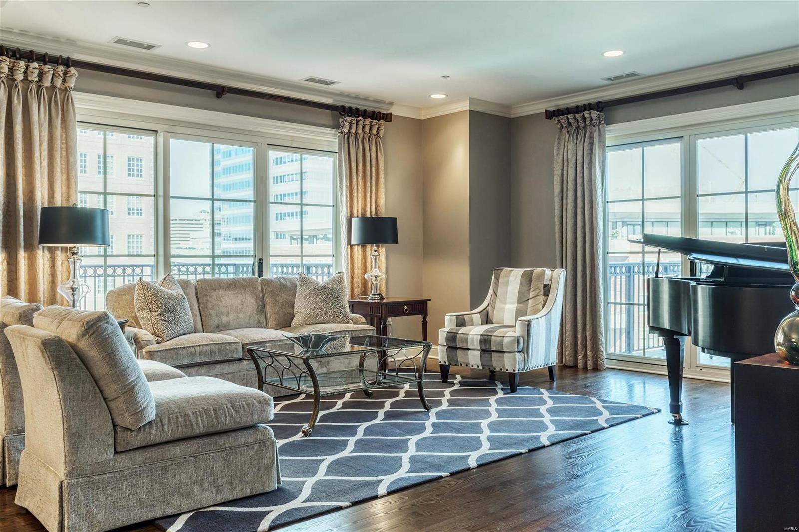Stunning elegance is showcased in this sleek and sophisticated 9th floor premier residence. Featuring a northwest exposure with two private terraces, natural light is a key feature of this renovated 2 bedroom, 2.5-bath condo. Entry foyer flows beautifully into a gracious dining and living room perfect for entertaining. The kitchen is a Chef’s delight with custom cabinetry, lovely granite counters, and top of line designer appliances adjoining family room with wall of custom-built bookcases. Master bedroom wing is a tranquil oasis with redesigned luxurious master bath with marble floors, double vanities and oversized custom shower, New Space designed walk-in closet and private study. So many wonderful appointments including custom wet bar, crown molding, gleaming wood floors, storage unit and 2 parking spaces. Exceptional opportunity to experience luxury living at it’s best...valet service, 24 hour doorman, concierge, pool, party room, rooftop garden, dog area, and fitness center. Location: City, Upper Level
