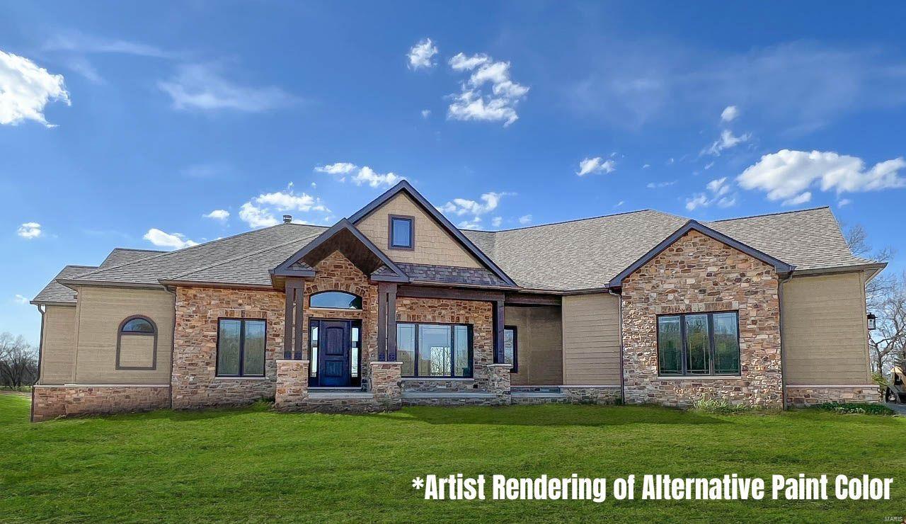 MOVE IN READY & BRAND NEW, NEVER LIVED IN! Bold, Beautiful & Practical w/"top-shelf" everything, on 21+ ACRES (suitable for horses or animals)! Built by one of Mo Co's. premier builders. 3+ garage w/10' ceilings & 2nd laundry. Hand stained 8' doors/ trim throughout. Powder room off drop zone.  Gourmet kitchen w/huge island & custom everything. Appliances 40" Hallmann black & copper 6 burner & GE Cafe line. Luxury line appliances w/ custom cabinets. Open great room w/17' ceilings wood burner. Columned dining. Marvin High end windows. Windowed walls create stunning frames for sunset vistas of rolling hills & valleys where wildlife loaf & play and CRAZY SUNSETS! Huge deck. Master w/private deck access, fireplace & romantic views! Ensuite w/6' jacuzzi, dual vanities, walk in shower. 9' pour walk out bsmt w/4th bed & 4th bath. Chalet arched stone w/views, views, views! Electric car port Pole Barn. NOT IN SUBDIVISION on large acreage, which makes this property the rarest kind of luxury home!
