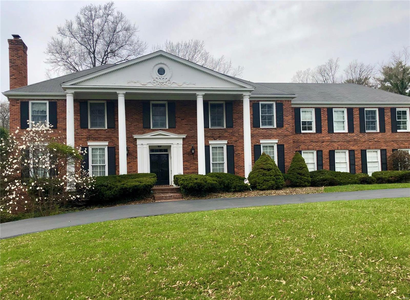 GREAT NEW PRICE! NOW an exceptional opportunity to restore this traditional Colonial gem,PREMIER 2.227 ac lot in Ladue. With updating, this well built home will be your family retreat.  
Location second to none!  Featuring 9ft ceilings, spacious, elegant rooms with custom moldings, built in bookcases, 2 cozy fireplaces, & wet bar. Remodeled kitchen, with top of the line Viking appliances and cabinetry; 2 large pantries, 2 half baths and first floor laundry with versatile walk in closet on main level. There's AMPLE SPACE to create an impressive open floor plan. 
Floors are hardwood under carpeting; parquet in family room. Upstairs has 5 bdrms, 4 full baths and an amazing 26x21, window lined room with endless possible uses, you decide - Office, Rec/Family Room, additional Bedroom Suite? Convenient back stairway to main level and 2 separate entry stairs from garage/house to basement. A Prestigious location, across from Old Warson Country Club. Duplicate listing #21016074.