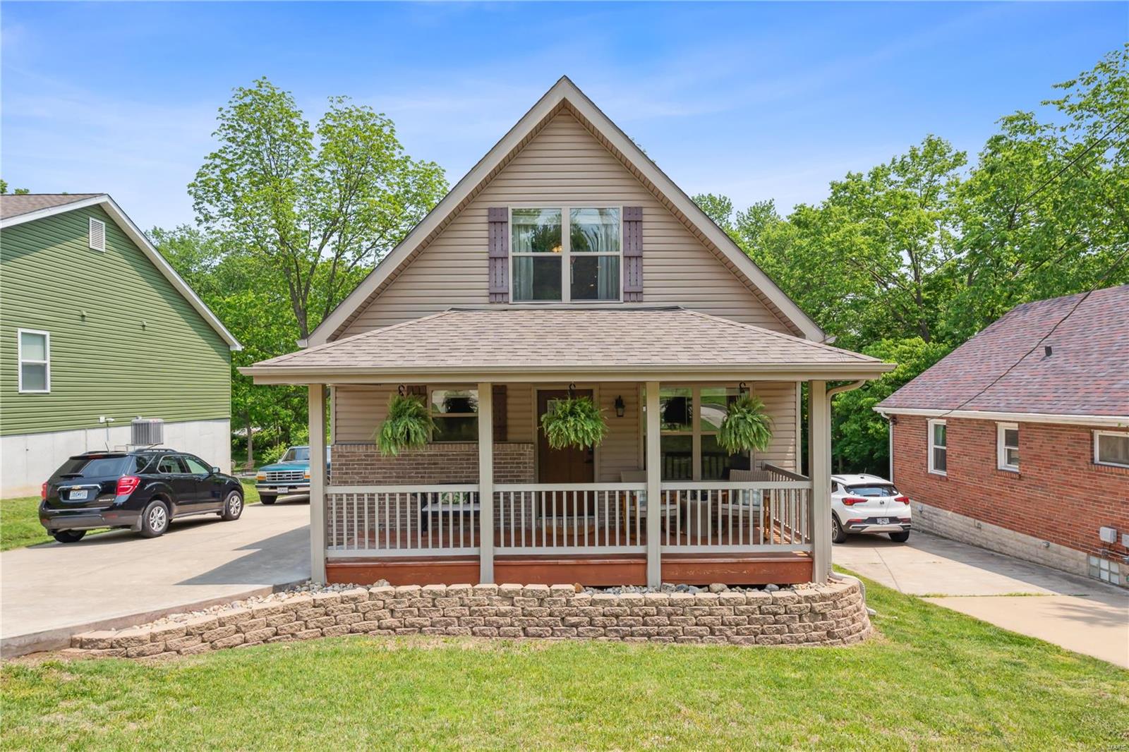 You'll love the curb appeal of this beautiful home! With a great front elevation and charming front porch, this house is sure to impress. Step inside to discover a completely rebuilt 2-story home with 3 bedrooms and 2 full baths. The hardwood floors and granite countertops add an elegant touch to the already inviting and comfortable vibe of the house. The large level fenced-in backyard provides plenty of space for the gardner, or owner who loves the idea of fun outdoor entertainment and relaxation. Back inside and upstairs the primary bedroom suite is a true sanctuary, featuring very large space with a big walk-in closet and a spa-like bath with a soaking tub, shower, and double sink vanity. Main floor includes open floorpan with two secondary bed rooms full bath and laundry. With an unfinished basement, there's plenty of potential to create even more space in this already-great house. Don't miss out on this amazing opportunity to own a beautiful turn-key, move-in ready home.