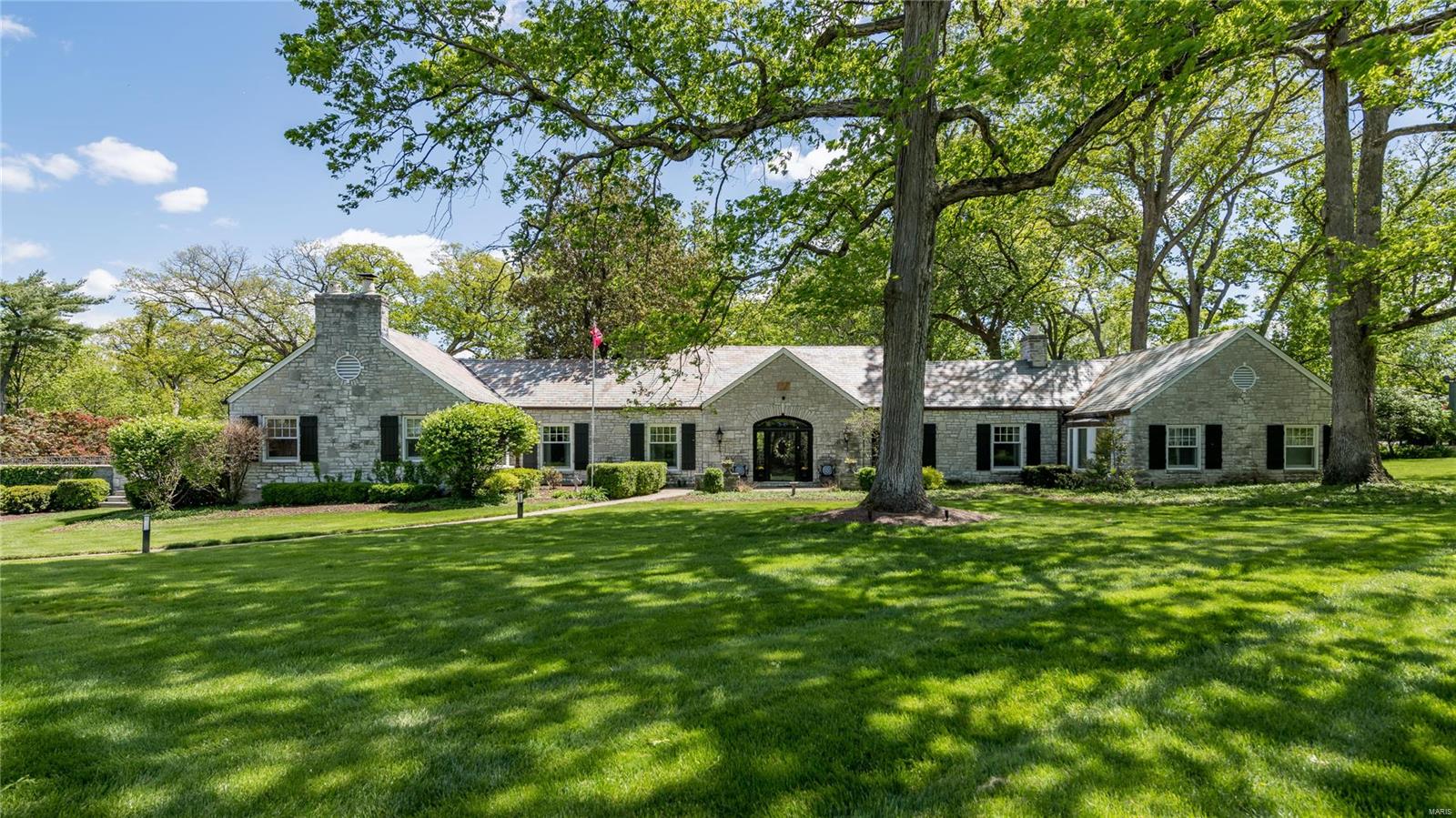 Experience tranquility and elegance in this lovingly renovated and maintained estate situated on 3.6 lush acres in Prestigious Huntleigh Woods. The Open Floor plan & walls of windows fill the home with light. From the moment you enter you will notice the high ceilings and gracious entry which flows into the Formal Din Room and Spacious Living Room. The state-of-the-art gourmet kitchen is perfect for hosting memorable gatherings & leads to all the Generous living spaces. Three fireplaces allow for private gathering spaces.  Luxurious primary suite offers a peaceful oasis with an office/dec area & a luxury bath w/ soaking tub & walk-in shower. Plus a private door to expansive & beautiful terrace. Additionally, 2 ensuite bedrooms provide privacy for family or guests. The LL features a rec room, 4TH Bdrm, & full bath. Outside, the private paradise awaits w/ an in-ground pool, expansive patios, lush greenery, & mature trees. The lush grounds offers numerous entertaining opportunities.