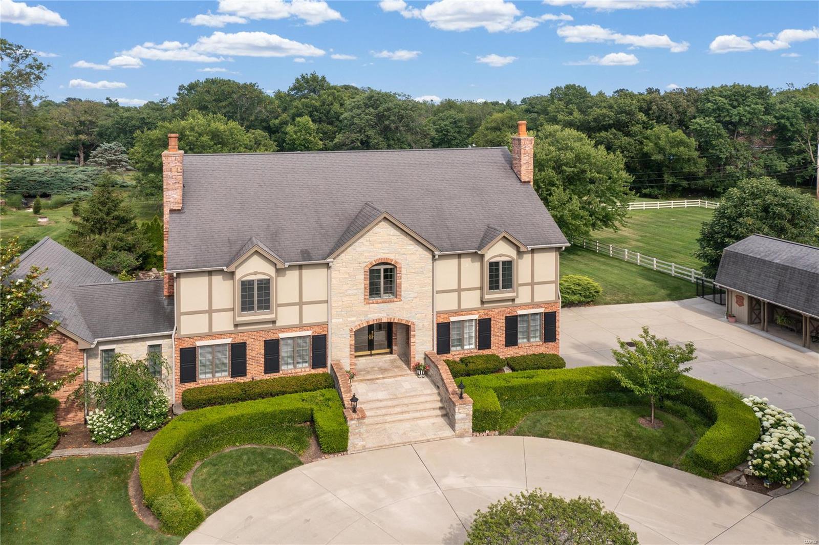 Idyllic, modern country estate rarely available & not to miss! In the exclusive, gated community of Country Life Acres & surrounded by sweeping vistas, this stunning 2-acre tranquil retreat features 5 beds & 7 baths (4 full/3 half) and over 6375 sq ft of living space that has been extensively renovated with gorgeous outdoor spaces. Baker pool & hot tub, professional landscaping, hidden koi pond & delightful patios all perfect for outdoor living & entertaining – also find picturesque barn & pastures for ultimate privacy. Current owners w/ architect Lauren Strutman transformed this spectacular home; opening walls, raising the roof, adding a new entrance & stonework, renovating all bathrooms, adding a new chef’s kitchen, plus adding a new wing with main floor primary bedroom suite. Main floor has dramatic GR, sunroom, LR & DR with fireplaces, wet bar, 2 offices, laundry & two ½ baths. Upstairs are 4 beds, 3 baths, 2nd laundry & kitchenette. LL has craft & rec rooms, ½ bath & 3 car garage! Additional Rooms: Sun Room