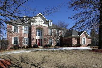 Updates galore in this amazing 2 story located in sought after Country Lake Estates in Chesterfield. Completely remodeled gourmet kitchen with 42 inch cabinets, quartz counter tops, GE Profile stainless steel appliances, tiled backslash, 2 sinks, oversized island, pull out drawers with soft close cabinets. Spacious hearth room with vaulted ceiling and gas fireplace. Upper level features master suite with coffered ceiling, his and her vanities, Jacuzzi tub and large walk in closet with organizers. 3 additional bedrooms complete the second floor and each bedroom has it's own bathroom. The walk out lower level has 2 additional bedrooms, 2 full baths, exercise room/possible media room, walk behind wet bar, rec room and family room. Backyard has spacious deck leading to inground heated pool and level lot. Additional features include plantation shutters throughout, wood floors, newer carpet, updated fixtures and 3 car side entry garage.