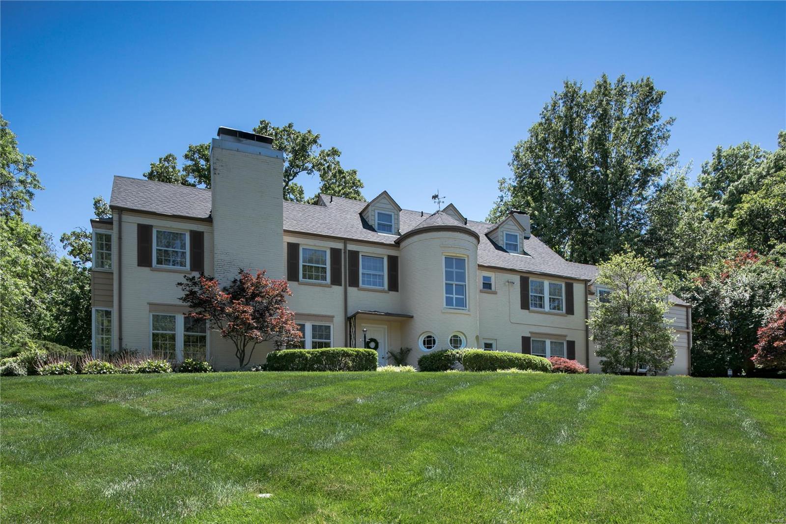 INCREDIBLE PRICE!! $215/sq ft.This home sits atop an acre+ w/sweeping lawns in a much sought after private neighborhood.Nearly the entire house has been renovated with a neutral palette,contrasting white millwork,gleaming hardwood floors & built-ins throughout.French doors lead from the elegant living rm w/woodburning FP to a new 4-season rm.Gourmet kitchen offers Viking 6 burners,wine cooler,double ovens,custom cabinets & opens to hearth rm w/gas FP & dining rm.Gracious master wing has large bay window,private bath w/twin vanity sinks,spa tub,steam shower, mirror TV & custom dressing rm.Other bdrms have large closets w/built-ins w/direct access to a full bath.2nd floor laundry,bonus room and back stairs.3rd floor has 2 large bdrms,jacuzzi bath & storage closet.Addt’l family rm in basement w/wet bar & 1/2 bath.New Roof,gutters& furnaces.2 car garage.