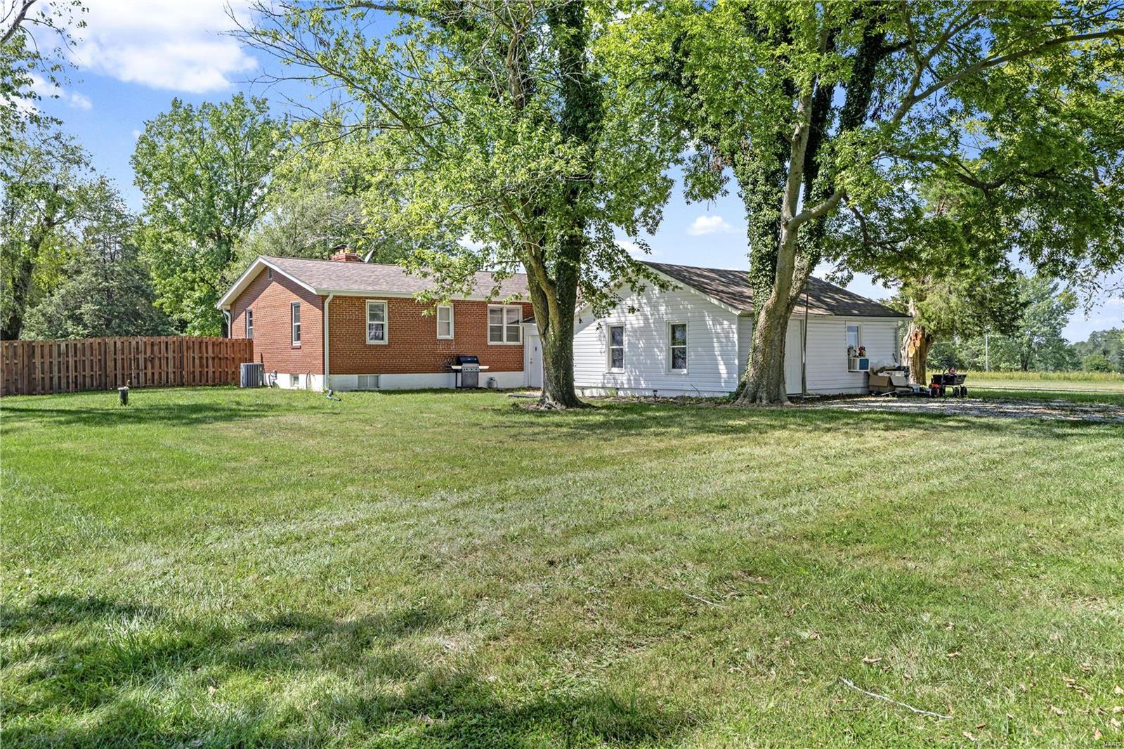 Beautiful with close access to highways, this property is 23+ acres has a house, outbuilding, pond, horse barn, 
and backs to woods at Rotary Park! Live close to work, but where you dont have to listen to the traffic!
This is a very peaceful location. 3 bed, one bath home, features additional large glassed in porch
that could be an extra bedroom, office, kids play or family room. 3 bedroom farmhouse, with 
basement and oversized garage with room for workshop! 
Offered in as is condition. If you are an agricultural business or looking for
a place for livestock, call today.  2 parcels involved in sale one APN 4-0008-S017-00-0010.3000000 12.17 Acres and the other is APN 4-0009-S016-00-0025.2000000 - 11.54 Acres. Broker is one of the owners. Family owned.