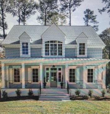 To Be Built - This location is the one your Buyer has been waiting for in downtown Kirkwood.Stunning OPEN 4 bdrm /3.5 bath 2 story Lewis Homes on a storybook block of East Madison just a 3 block walk from downtown Kirkwood.Impressive finishes thru out ;cased doorways,hardwood floors on 1st floor & 2nd floor hallway & Master Bedroom, 9' pour ,9' 1st & 2nd floor ceilings, crown moldings, custom cabinetry,& job built bookcases. The formal Dining Room w/ wainscoting flows thru to a Butler's pantry that enters into the Gourmet Kitchen. The spacious kitchen has an oversized island, granite counters, custom cabinetry & SS appliances & OPENS to the Great Room w/ custom mantle and fireplace.Master suite features beautiful tray ceiling & luxurious Master bath w/ custom vanities & dual walk in closets finished by St Louis Closet Co. Spacious secondary bedrooms with Jack n' Jill bath and 4th bedroom with private ensuite bath.2 car detached oversized Garage .Deep lot has space for a pool.Hurry! COOL: 14 SEER+