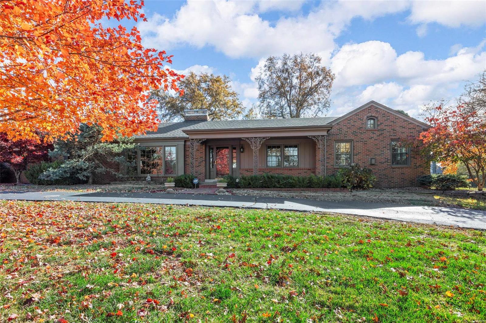 Since 2016, this stunning mid-century ranch has been meticulously renovated with timeless finishes and quality craftmanship. The main level of the home was reimagined to create the perfect flow for everyday living and entertaining, including moving stairs and walls and raising ceilings to create dramatic vaults and interesting trays. The result is a bright and open floor plan anchored by classic hardwood floors. The beautifully remodeled kitchen is perfectly positioned for interaction with the main living areas and provides access to the covered patio for seamless movement from indoors to out. The level backyard also features a stone bar with 2 grills and a heated/cooled inground pool. The expanded primary suite is a peaceful retreat with its spacious luxury bath, two walk-in closets and cozy sitting area with floor-to-ceiling stone fireplace. The finished lower level includes a guest suite, full bath, recreation space and kitchenette, adding 1700+ sq ft of add’l. living area.