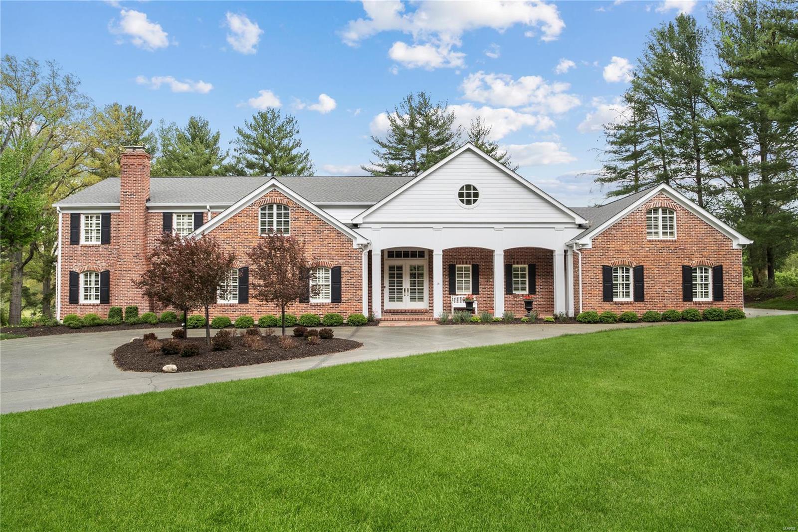 Situated next to Bellerive Country Club, this meticulously maintained residence beckons its next owner. Soaring ceilings offer a grand welcome, extending views to the verdant backyard. A spacious great room boasts a cozy fireplace, bespoke bookcases, and a wall of windows leading to the flagstone terrace. The kitchen is a culinary haven equipped with top-tier appliances and an adjacent 500-bottle wine cellar, while the butler's pantry offers seamless access to the dining room. A dual-sided fireplace adorns the formal living room and office. The luxurious main-floor primary suite boasts two walk-in closets and a spa-like bathroom. Upstairs, a large family room and two ensuite bedrooms accompany two additional bedrooms sharing a bath. The lower level hosts a rec room, full bath, and storage. Outside, manicured landscaping envelops multiple flagstone terraces, ideal for al fresco dining (and room for a pool). This impeccable property culminates with an ample 4-car garage. Additional Rooms: Mud Room, Wine Cellar