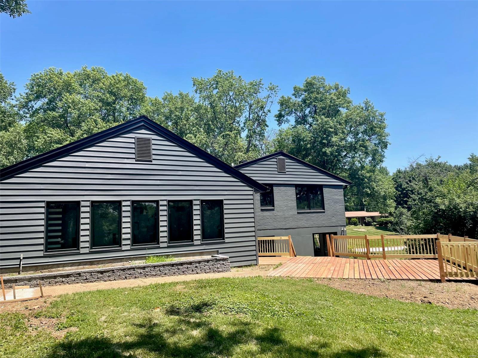 Nestled on this quiet street in Olivette is this mid-century home. It has been entirely renovated with every custom detail. All new Wolf appliances, walnut cabinets, and quartz counters. Aesthetically modern and gracious. Large lot, oversized two-car garage which is detached.