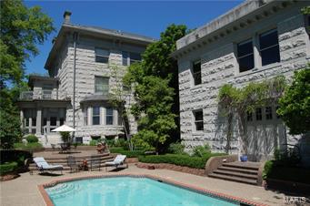 Historic Central West End Mansion created in cut tumbled limestone, in the most ideal location of Portland Place. 5 Bedrooms and 9Fireplaces. Resort-style living with poolside gardens, terraces and patios. Across from Forest Park, and walking distance to everything you could desire; Museums, Zoo, The Boat House, Walking trails, Bicycle paths, Golf & Restaurants. Participate in an active and energy filled lifetsyle, both day and night. 2000SF unfinished Carriage House. An easy to live with floorplan, open, manageable and extremely functional. Newer systems & roof, forced heat and air. Architectural details fill home home, both inside and out. 10' ceilings. On the Main Level find classic living and traditional formal dining rooms, kitchen, butler's pantry and enclosed sunroom. The 2nd Level features Master+3 full bedrooms. A knockout 3rd level offers billiard room, lounge, potential gym and studio/craft rooms.