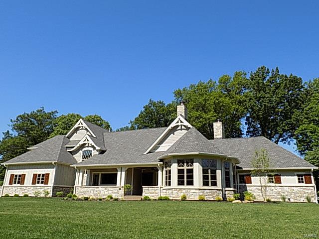 New Construction!! Now Complete!! Price just reduced!  Exquisite  Custom built 1.5 story in sought after Frontenac  Location! Fabulous 1+  acre+ level lot ! Spacious 4+ bdrm, 6 baths, 1.5 story with 3 car side entry garage! HIGH END finishes incl:  Fabulous Gourmet kit. w/ granite, Thermador stainless appl’s, Opaque-Glazed and Stained Custom Cabinetry and Beverage hallway w/ Granite, wine cooler, and ice maker! Schlage Satin Nickel hardware pkg. Generous Vaulted Great rm w/ f/p, breakfast rm. Main floor and 2nd floor laundry! Job finished Hardwood floors on 1st floor. Luxury master suite w/ coffered ceiling and sitting room, private door to covered patio w/ stone fireplace, and more!  “Devonshire” limited lifetime roof, and full lawn and plant bed sprinkler system!  Custom Mahogany front door!  Ready to move in!  1 Year Builder Warranty Free to Buyer!  Executive living at it’s best!!!!