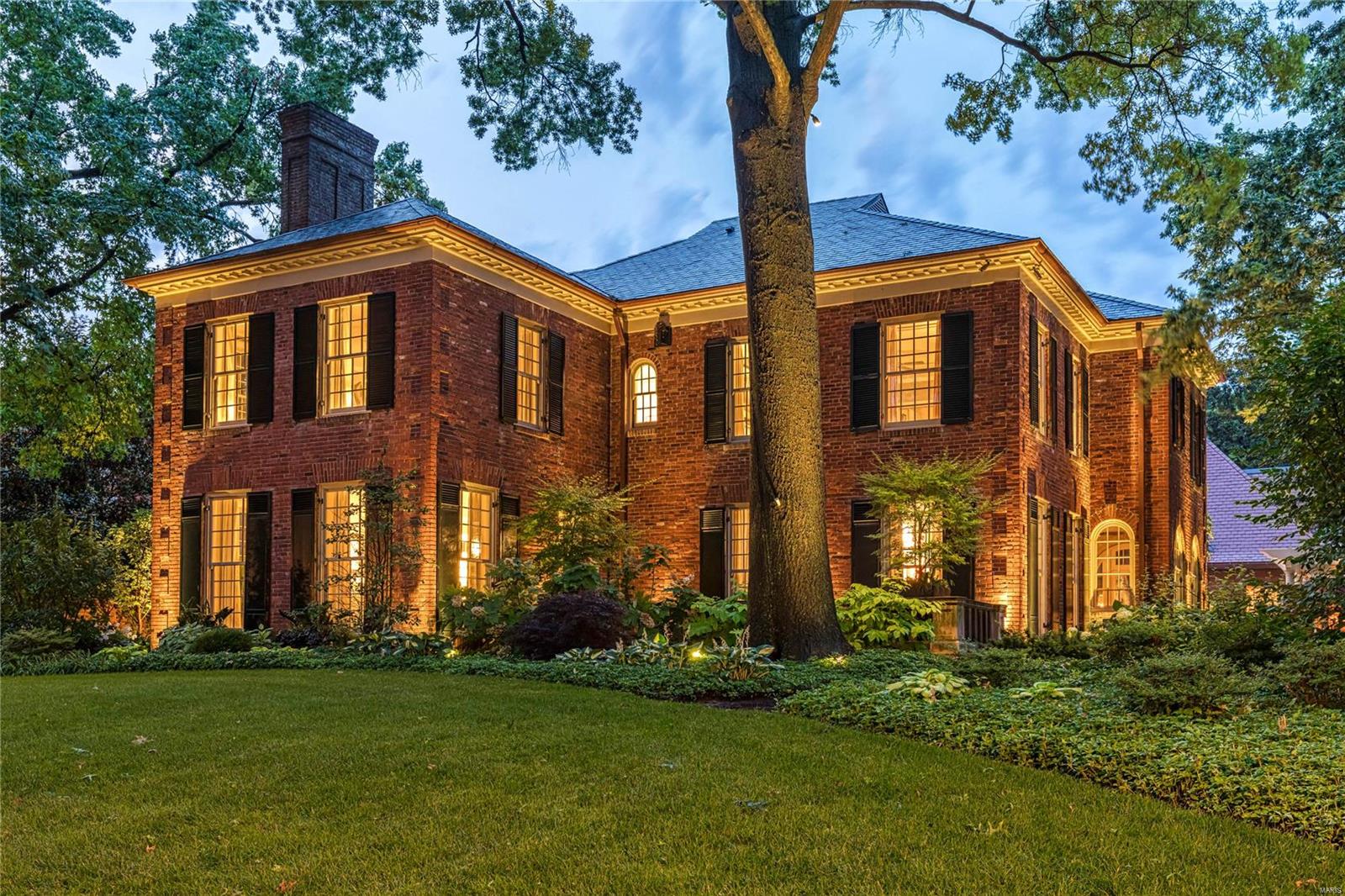 Spectacular Georgian Revival, originally designed by Gale Henderson-notable architect, offers a stunning main house plus a 6,000sf carriage house circa 1888. You'll find a vibrant mix of classic design and modern flair throughout.  1890 Tennessee marble and a 19th Century square piano re-purposed as the center island of the designer kitchen are just a few of many highlights. In the living room, there is one of 7 gas fireplaces, floor to ceiling windows, and french doors leading to a private limestone veranda.  An exclusive ensuite master bedroom with accessory, shoe & clothing closets also offers heated floors, Danby marble dual vanity, custom shower, & soaking tub in the master bath. A professional catering kitchen, ensuite bedroom, exercise room, wine cellar, and cooled fur storage rounds out the walk-out lower level. Entertain your guests in the garden under the covered pergola and in the saltwater pool. See Features attached-completely new infrastructure in main and carriage house. Additional Rooms: Sun Room, Wine Cellar