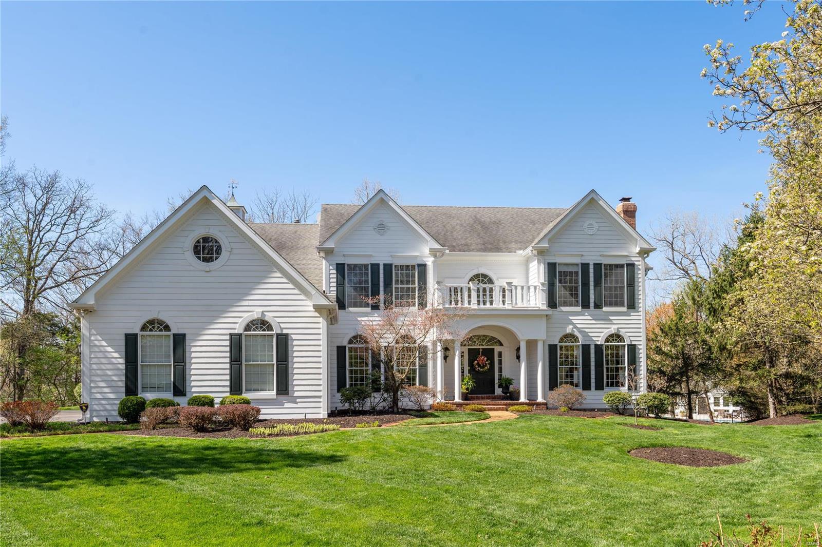 Unwind in style and sophistication at this estate in Ladue Schools. European Oak wood floors guide you through the main level, starting in 2-story foyer, custom office, and formal dining room, continuing to great room with floor-to-ceiling windows & fireplace with stone surround. Custom-built bar flows directly into gourmet kitchen with butler's pantry, quartz counters, Subzero/Wolf appliances, and breakfast table. Gather in the hearth room with vaulted ceiling, fireplace, and access to patio and deck. The main floor primary suite features 2 walk-in closets and a fireplace; a large walk-in shower, jet tub, and custom cabinetry await in the spacious bath. A laundry room and 2 powder rooms complete the main floor. Upstairs, 4 spacious bedrooms offer organized walk-in closets and access to Jack & Jill baths. Escape to the lower level w/ a rec room, bedroom, bar, game room, fitness room, and crafting rooms. Spacious backyard, pool, and pool house greet you outside. Amenities are endless!