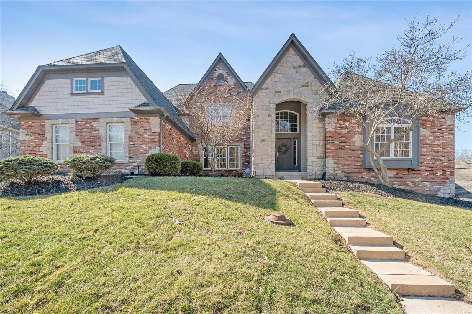 Exquisite Fischer-Frichtel former display is a true trophy property showcasing unparalleled scale, luxury and sophistication. The stunning 2 story foyer has stone floors and offers a view into the light filled great room w/flr to ceiling stone hearth, 20 ft ceilings, new wide plank hardwood floors & bowed floor to ceiling windows. The updated kitchen also features wide plank wood flooring, an immense island, quartz counters, professional grade Wolf appliances w/stylish backsplash, hearth rm, breakfast rm, butler's pantry & wet bar. The spacious MF primary has an elegant tray ceiling, large bath and custom closet. Upstairs you'll find 3 generous bedrooms with walk-in closets, 2 full baths and a bonus/play room. Amazing LL is highlighted by box beam ceilings, stone fireplace w/custom built-ins, custom walk-behind bar, exercise room, 2 beautiful bedrooms & 2 full baths. The yard is large & level with a new patio w/firepit and fully fenced. Pool plans, approved by Wildwood, are available. COOL: 14 SEER+