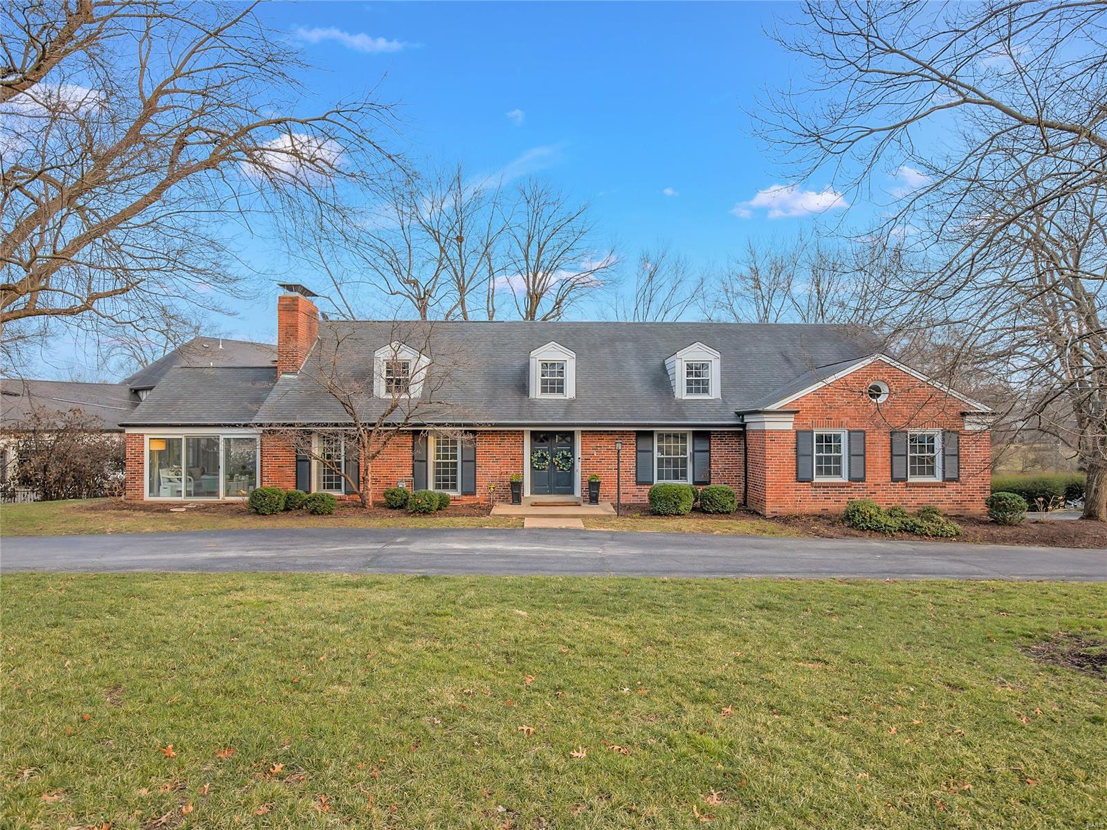 The marriage of stately Ladue sensibility with meticulous 'au courant' modern updates! You will not believe your good fortune to find this thoroughly fresh, light, bright 1 ½ story filled with charm and style. Cool paint colors and designer papers accentuate the carefully selected details as the current owners transformed the vintage quality by polishing the hard wood to maximum shine  and remodeling the gourmet-lovers kitchen to perfection. Seizing space in imaginative ways expands the open concept breakfast room and bar, while an assortment of additional living areas are superbly decorated and enhanced for the ultimate in living and entertaining. Great baths, bonus built-in library nook, large second floor hangout/family room/study gives everyone a place to play and recharge while the walkout lower level is ready for exercise and what have you! Beautiful main floor owner's suite, large lot, & expansive garage with room for 4 cars tandem. Move in, make yourself at home and just enjoy! Additional Rooms: Sun Room