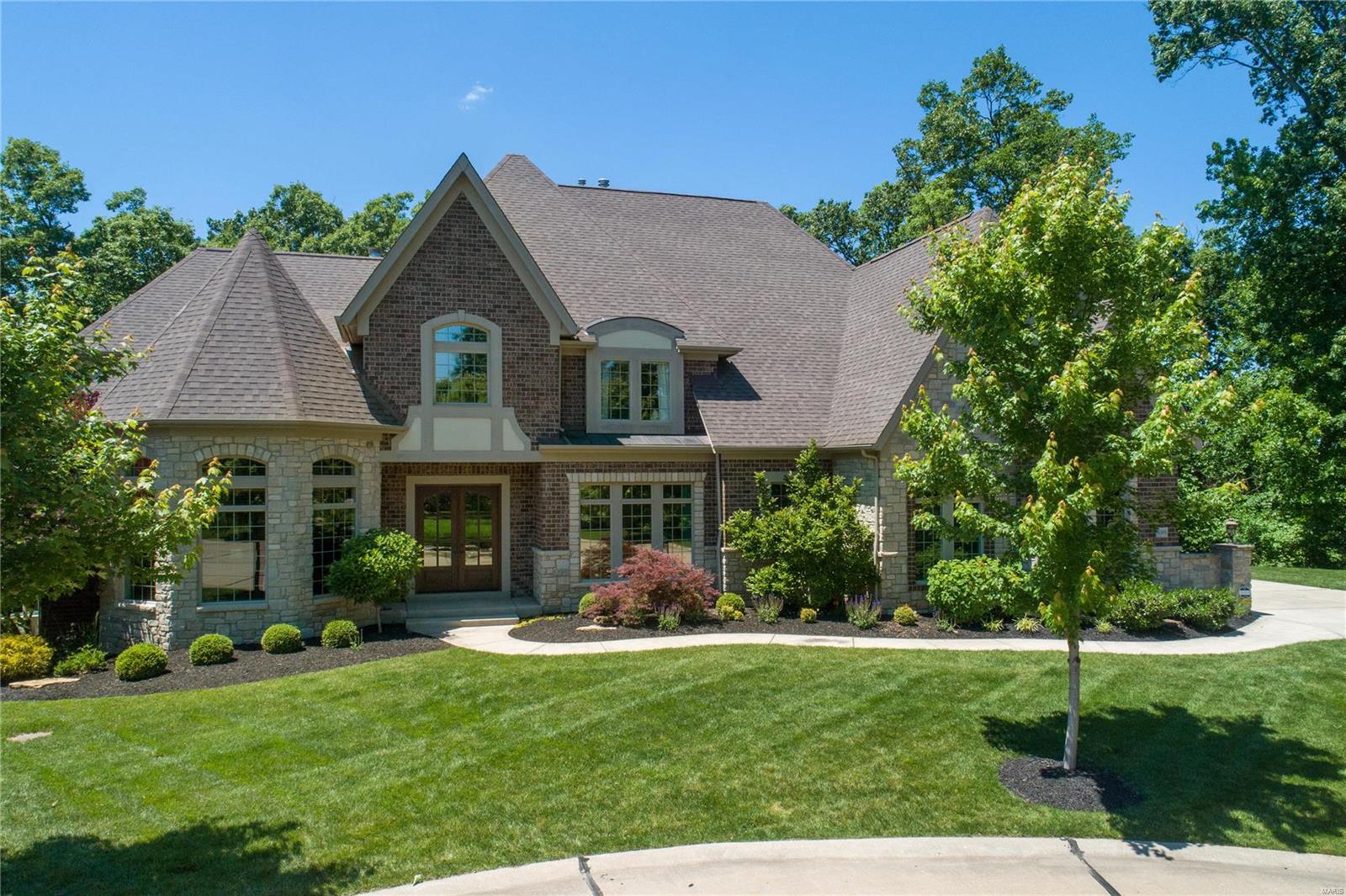 Premier property in Fox Hill Farms offers a private setting & exceptional features! Beautifully positioned on the culdesac, this attractive elevation offers versatile interior spaces & amazing finishes! The two story great room connects with a wet bar, spacious hearth/breakfast room & well appointed kitchen! The kitchen offers an over-sized center island, access to the low maintenance deck, & rear staircase leading to the 2nd fl. The LL extends the opportunities with a family room gathering area around a 3rd fireplace,wet bar,amazing wine cellar & 5th bedroom en suite [yet plenty of storage!]! Walkout to the lower patio & enjoy the custom outdoor stone fireplace or relax on the under deck patio area! Natural light fills the front office on the main level! Three nicely sized 2nd fl bedrooms,freshly painted interior,new carpet,professionally landscaped,4 HVAC zones,family center/utility room & "chefs bath" off the kitchen add to the list of features! Additional Rooms: Wine Cellar