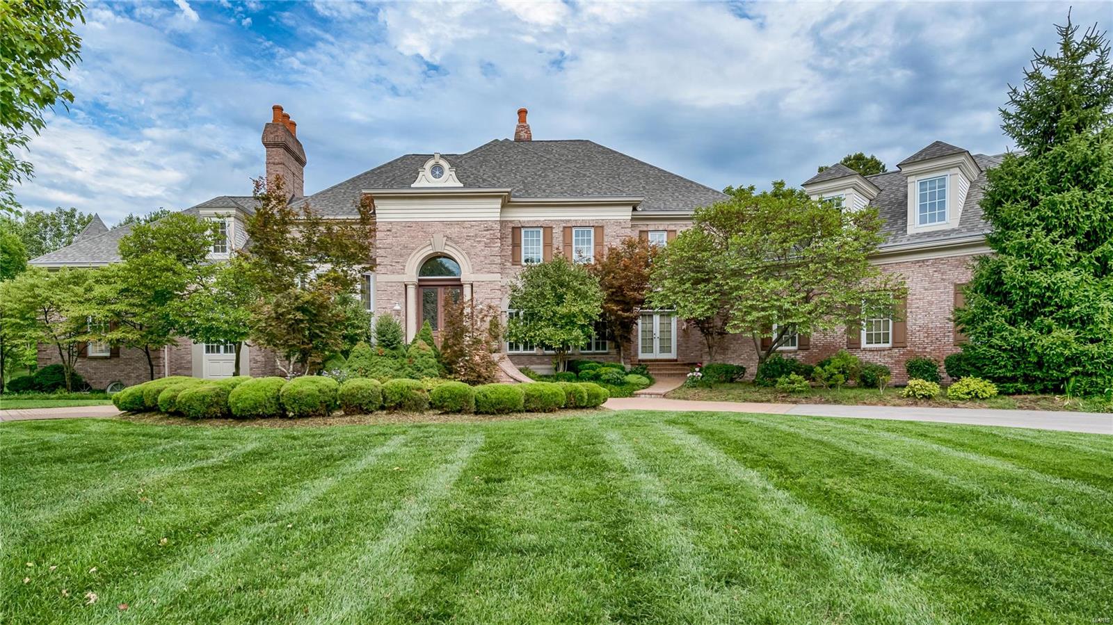 Not all homes are created equal. When a famous interior designer and a prominent builder/engineer join forces to create the home of THEIR dreams WE get to experience a home that is built with the finest materials and with every detail closely inspected to be both functional and breath-takingly beautiful. This 5bd/8ba masterpiece sits on 1¼ acres; with attention paid to every detail of this home, you will truly appreciate the balance of the space and the functionality of the flow. From the Venetian Chandelier to the 10’ Honduran Mahogany wood doors…this home has taken the finest attributes from all over the world to compose this magnificent achievement of a home. Other features: Chef’s Kitchen, Theater Rm, Exercise Rm, Full Bar, Billiards Rm, Poker Area, 2nd Steam Rm, 2nd Laundry Rm, Covered Patio with fireplace, Walk out Basement, 4-car garage. For those who can appreciate true quality and craftsmanship and sophistication that will withstand the test of time…this is the home for you! Additional Rooms: Mud Room