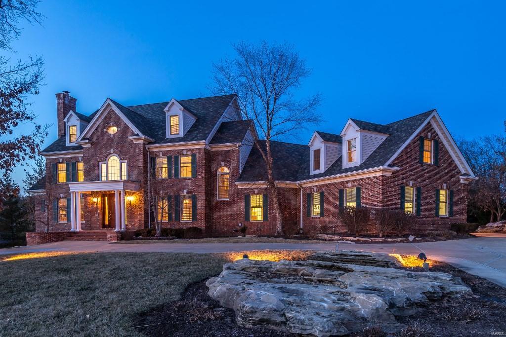 See attached future pool renderings! Spectacular 6bd/8bth 1.5 story home on wooded 1.13 acre lot! 8400+ sqft of living spc. 2-Story Foyer leads to Den w/fireplc & built-ins; coffered Dining Rm; Living Rm w/picture window & wetbar; amazing 2-Story Hearth Rm w/window wall & fireplc; gourmet Kitchen w/custom cabinets, granite & highend appliances incldng fridge; octagonal Brkfast Rm; lrg Master Ste w/fireplc, private deck & Masterbth w/jetted tub, sep shower, dbl vanity & walk-in closet; 2 Powder Rms; & Laundry. 2nd flr w/4 bdrms (2 w/private full bths); 3rd full bth & Bonus Rm. Amazing finished walkout LL has 10’ pour, Rec Rm w/stone fireplc, custom Wetbar; state-of-the-art Media Rm w/screen, projector & surround sound; Family Rm; bedrm w/full bath; Exercise Rm & Powder Rm. Features: 2 yr old roof, 4 zoned HVAC, alarm, sprinkler system, back-up generator, central vac, 4 car attached side-entry garage & park-like yard w/several patios, fish pond & firepit!