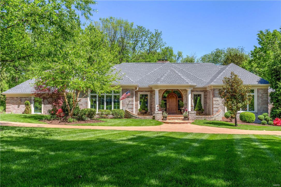 Spectacular renovation! Stunning brick 1.5-sty in prestigious Thornhill Estates. Elegant marble foyer with dramatic flared staircase leads to library-paneled study with built-in bookcases & entertainment center, sophisticated dining room & step-down great room with marble fireplace & atrium doors that open to brick terrace. Designer kitchen with granite countertops, custom cabinetry, professional quality appliances, center island, wet bar & butler’s pantry adjoins light-filled breakfast room & vaulted hearth room highlighted by marble fireplace. Sumptuous master bedroom suite features walk-in closet with laundry, marble bath with Aquatic tub & atrium doors to private deck. The 2nd floor extends the living quarters with 2 large additional bedrooms & hall full bath. Professionally finished walk-out Lower Level includes recreation room, 2nd kitchen, office/sleeping area & full bath. Situated on a 1+ acre cul-de-sac lot with terrace, Koi pond, patio with gazebo, heated pool & 3-car garage.