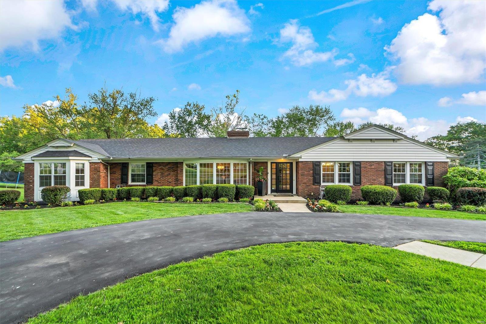 Beautiful 4 bed 3.5 bath updated ranch in the heart of Town & Country on 1.25 acres that backs to a private road.Divided floorplan w master en suite that features a sitting area, private bath w double vanity & large shower & large w/i closet.Updates include all new flooring throughout w hardwood floors on the main level, gorgeous ceramic tile in bathrooms & laundry room, new carpet in beds 2-4 & luxury vinyl plank in lower level.Quartz counter tops in kitchen, baths & laundry.2 New ventless fireplace logs 2020.Newer stainless-steel appliances including double oven.New Gas stovetop w gas line installed by Spire.Luxury interior doors.New light fixtures throughout.Expanded asphalt driveway for extra parking & repaved.New garage door openers.New furnace 2020, new roof 2020, whole house generator 2021, freshly tuckpointed exterior, professional landscaped uplighting.Zoned heated/cooling.Two hot water heaters.Walk out.3 Car garage.Sellers are licensed broker/salesperson in the state of MO.