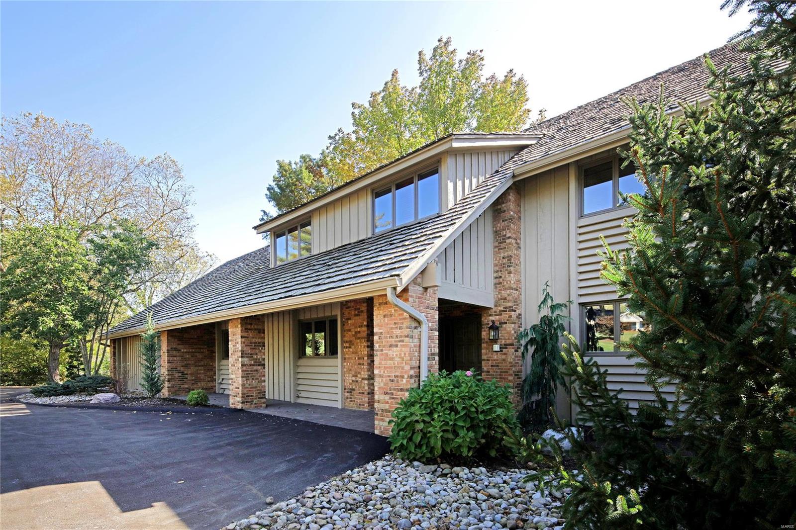 Great new price for a new year! Horse property in Kirkwood school district!! Colorado contemporary designed by Ted Christner. 3-acre property ideal for your horses or ponies with direct access to the Bridle Trails. Neighborhood is surrounded by 50 acres of equestrian property and 3-acre minimum zoning. Home features vaulted ceilings and open spaces with a rustic flavor.  Main living spaces have a southern exposure overlooking property. Kitchen and main level master suite are beautifully updated. Great room and breakfast rooms. Walkout lower level has spacious game room, custom walk-behind bar and temperature controlled wine cellar, exercise area, half bath and extensive storage. Antique billiards table stays.  Outdoor spaces include deck, screened porch, and patio.  4,498 sq. ft. plus approx. 1,300 sq. ft. finished in lower level for a total of 5,798 sq. ft. of living space. THIS IS A TERRIFIC HOUSE! DON'T OVERLOOK!