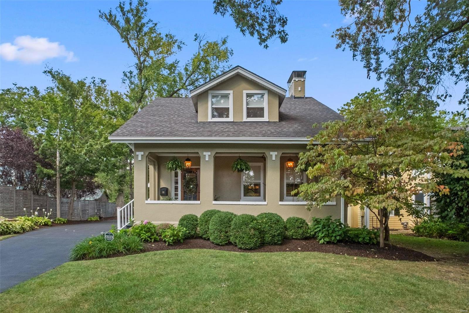 Do you dream of having a completely updated home with elevated finishes and walkable to all of downtown Kirkwood? This is the stunning 4-bedroom,2.5-bathroom gem that you have been seeking. Every detail has been perfectly curated. Porches on the front and back of the home are functional and charming. The open-concept layout of the first floor seamlessly connects the living and dining areas. The well-appointed kitchen boasts high end appliances and an amazing marble island/countertops with a window seat that opens for storage(swoon). The main floor primary suite is a retreat,featuring a generous walk-in closet,luxurious bathroom and custom built in. Three bedrooms,an office,full bath and many walk-in closets allow for versatility. The detached two-car garage is insulated and complete with a mini split allows for year round use. Large level landscaped yard that is fenced for the protection of your 2 and 4 legged friends.Don't miss the chance to make this exceptional property your own!