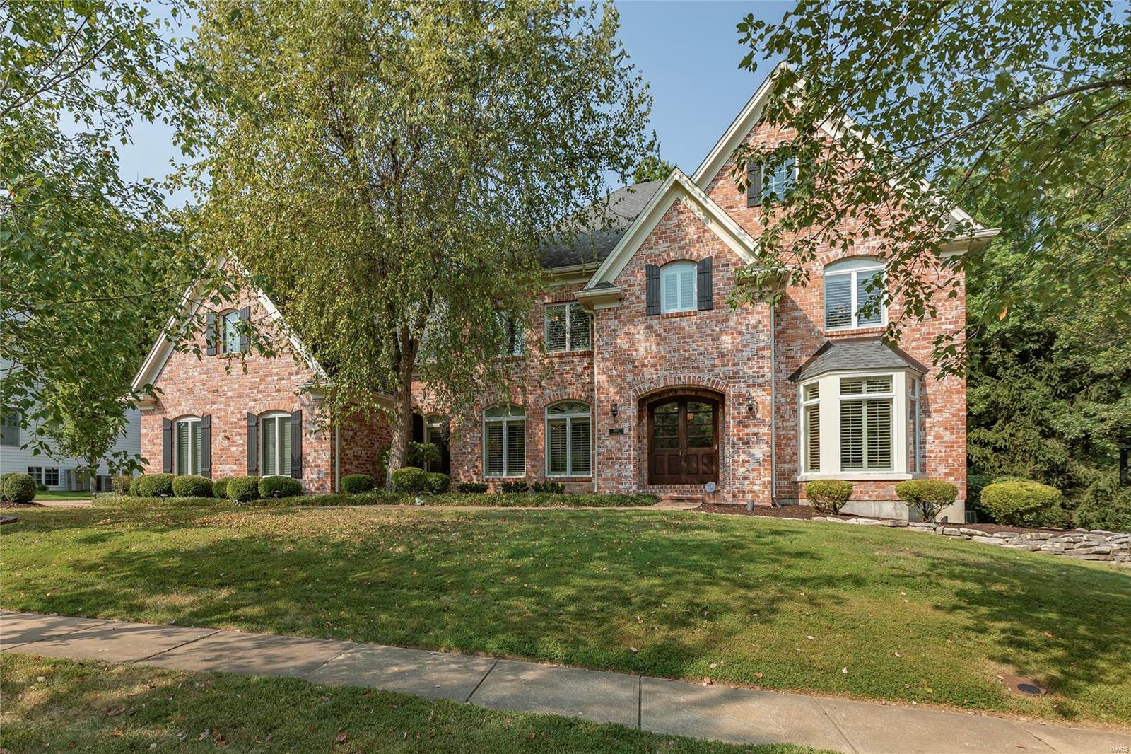 Stunning 2-story, custom home in the prestigious Country Lake Estates Subdivision – Top Rated Rockwood Schools! This 4 bedroom, 4.5 bath showplace, with over 6,700 Sqft of living space, has significant updates throughout, boasts a terrific open floorplan, is painted in stylish, neutral colors throughout highlighting the beautiful architectural details, and truly move-in ready. Once you step inside the handcrafted front doors, you will know you are home. Additional highlights include zoned HVAC, 10’ ceilings, wide plank hardwood floors, plantation shutters and custom window treatments, high-end light fixtures, central vacuum system, professional landscaping, outdoor lighting, sprinkler system, and an attached, oversized 3-car garage, just to name a few. Relax outside in your own private oasis, offering 2 Belgard paver patios, 1 with built-in and seating wall, all while admiring the professional landscaped yard. This house has it all, and is perfect for entertaining family and friends!