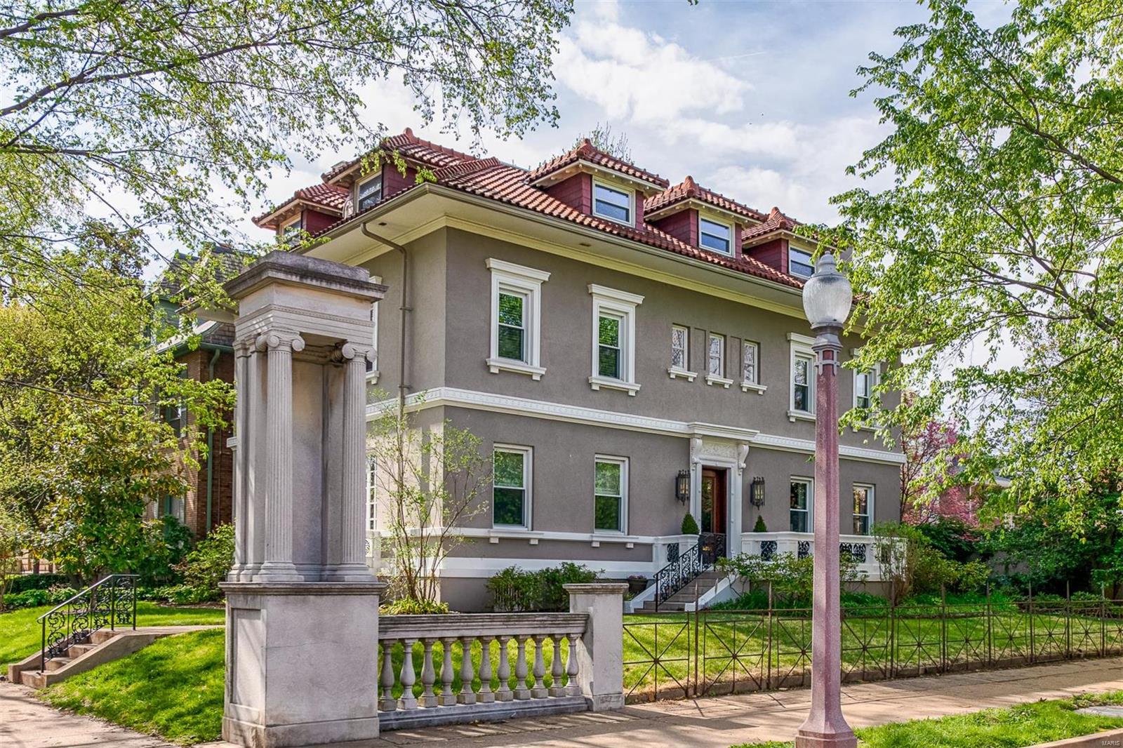 Magnificent 1909 Central West End home designed by George W. Hellmuth. This historic residence exudes old-world charm while containing modern amenities. Enjoyable distance to Forest Park, Maryland Plaza coffee shops and restaurants and Metrolink. The chef’s kitchen includes a 6-burner gas range with double ovens, granite countertops, eat-in kitchen with center island and butler’s pantry. Phillip Jeffries grasscloth wallcoverings accent the elegant dining room. Off the master bedroom you’ll find a spacious walk-in closet. Look for Roman travertine marble in the master bath along with radiant-heated floors. The 3rd floor is a spacious
2-bedroom apartment with kitchen, full bath, washer/dryer and its own separate entrance. Relax by the in-ground Pebble-Tec pool. Oversized 2-car garage with updated electric for your Tesla or other electric vehicle. HSA Home Warranty with home and pool coverage.  Owner is a licensed REALTOR.