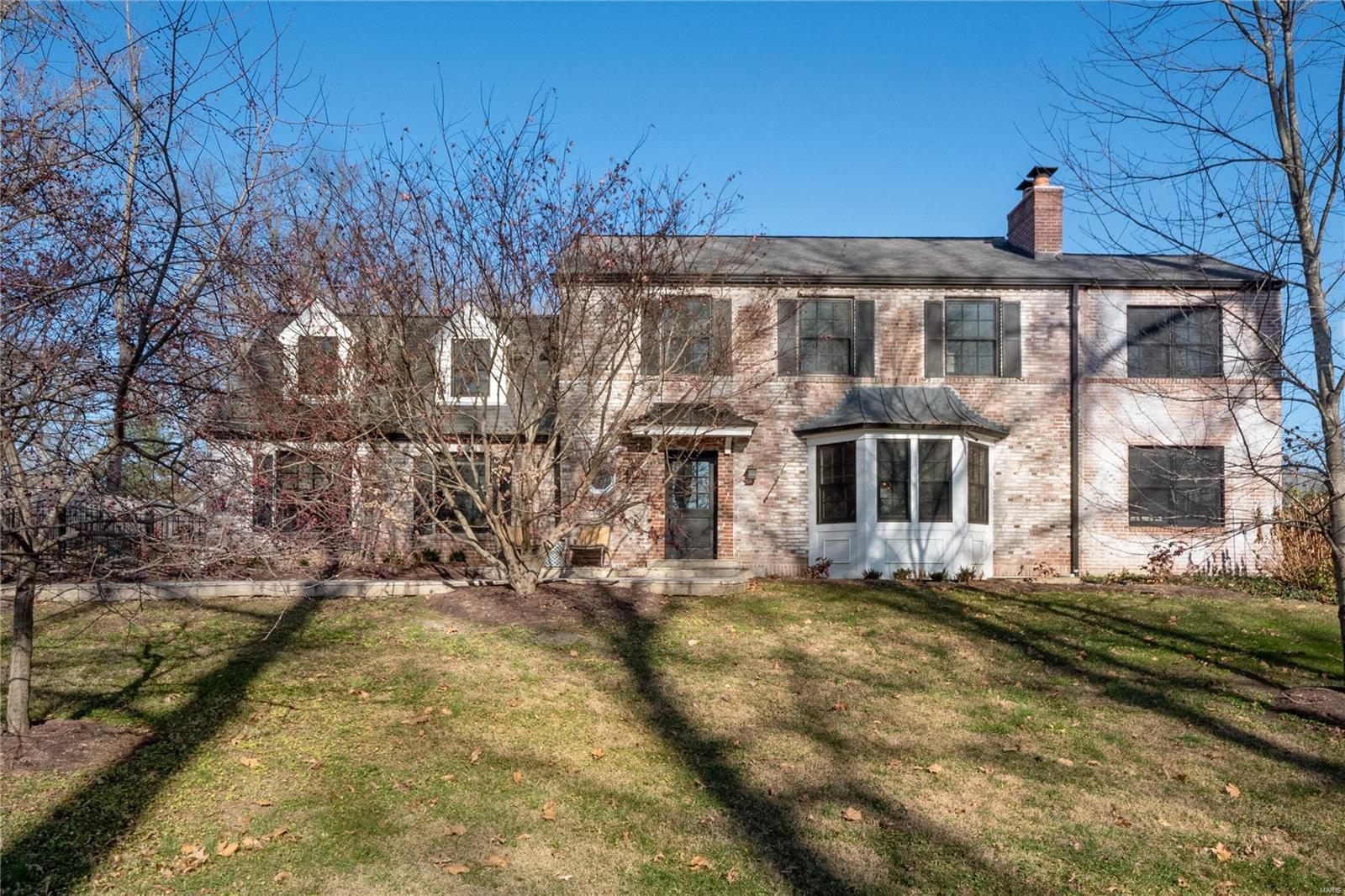 Charming & sophisticated 2-story home in the heart of Ladue. Private 1/2 acre lot offers an expansive yard plus pool & flagstone patio for effortless and chic outdoor entertaining. Glowing entry welcomes you to a spacious floor plan w/ sleek hardwood flrs & impeccable updates throughout. Light-filled LR w/ stunning millwork, built-ins & wood FP leads to the perfect home office w/ built-in desk. Stunning cook's kitchen features custom cabinetry, center island, top of the line appliances & a cozy breakfast rm w/ built-in storage & bench seat. Transition into the beautiful DR w/ FP & double french doors leading to patio. Large & efficient mud rm plus laundry off the 3-car garage, plus main full bth. Upper level features ensuite BR, 2 BR's w/ jack & jill bth & spacious Primary BR w/ walk-in closet & updated lux. full bth. Finished LL provides add. FR w/ gas FP & half-bth, plus ample storage space. A RARE Opportunity in the Ladue School District. Additional Rooms: Mud Room