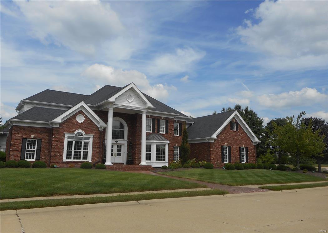 Custom built executive home in Sunset Hills Estates. On one of the most coveted lots in Sunset Hills this home is located on the lake with breath taking views. Present owner has remodeled kitchen with top of the line fixtures, granite counters, tile back splash. Butlers pantry. Breakfast Nook. Planning desk.  Hearth Room leads to Sun Room and Court Yard. Main floor Master Suite with 2 walk in closets. Detailed Triple Crown Molding Ceiling. Main Floor Office with custom wood work. Wall of windows in Formal Living Room with unobstructed lake views. Main floor laundry. Finished lower level walks out to lake and beautiful landscaped yard. Covered Patio for outdoor enjoyment.  Updates too numerous to list. Geothermal HVAC. Security system. Roof 2010 with 50 year warranty. Gutters and downspouts 2010. Home has been lovingly cared for and maintained. Not a drive by. Call today for a private showing. Additional Rooms: Sun Room