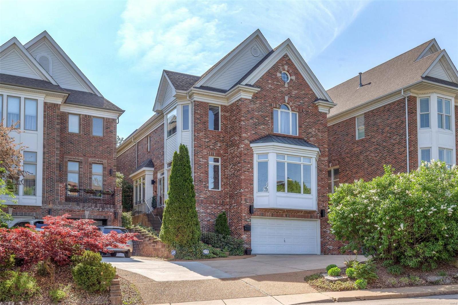Updates since last sold in 2015:  Two New A/C & Furnaces, new kitchen, butler's pantry, hearth bar & fireplace surround, new carpet throughout, new light fixtures, new wet bar & full bath in lower level, new exterior decking, fencing, irrigation system, turf grass and Bocce ball court.  Roof is 5 years old.