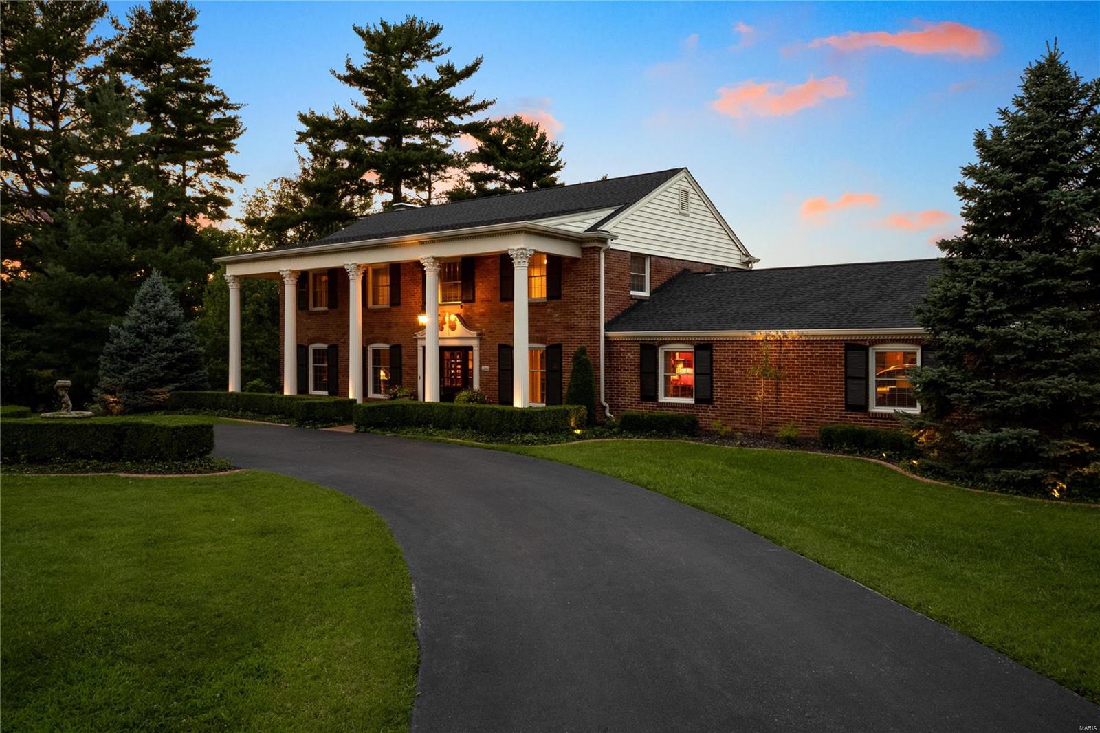 The beauty and breadth of this flawless property’s charms will fill your heart with joy and make you want this for your own. Sprawling grounds, peaches plucked from the tree, summer days lounging beside your sparkling inground pool while the neighbor’s noble steeds keep watch (while secretly coveting your meticulous lawn), crisp clean air, scintillating sunsets... life is good!
Retreat from nature and your new home awaits. And what a home! A horseshoe driveway winds to a stately entranceway flanked by towering Corinthian columns. Inside, marvel at the home’s supreme craftsmanship and attention to detail. This grand residence showcases lustrous timber in its impeccable floors, doors, stairways and exposed beams. Surfaces, fittings and finishes are exquisite - evidence of a discerning eye. Wide windows deliver sweeping views and swathes of natural light to your luxurious living spaces. Bodacious bedrooms, opulent bathrooms and so much more to adore! Be still, my beating heart