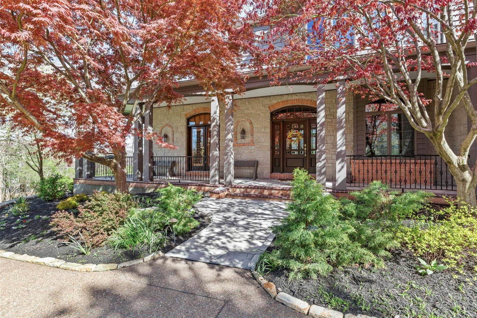 OPEN HOUSE CANCELLED! Welcome to this stunning home, prioritizing sustainability w/ geothermal heating & cooling, solar panels, & a whole-house generator. Nestled on 3+ acres, this custom 1.5-story residence blends eco-friendly living with luxury. The floor plan boasts 2 master suites: one on the main floor with a lavish bath & another upstairs with his-and-her closets and private laundry. The gourmet kitchen features granite countertops, a Sub-Zero refrigerator, & a large island opening to a vaulted hearth room w/ a cozy brick & stone fireplace. The 2-story great room, custom built-ins, dining room with tray ceiling, & private den enhance this home. Downstairs includes a media room, 2 bedrooms, full bath, storage area, additional laundry, & a walkout leading to the spacious backyard. When outside, enjoy the expansive deck or relax in the peaceful screened-in porch. Wrapping up this one-of-a-kind home is the aggregate driveway leading up to a 3-car garage and detached garage/workshop.