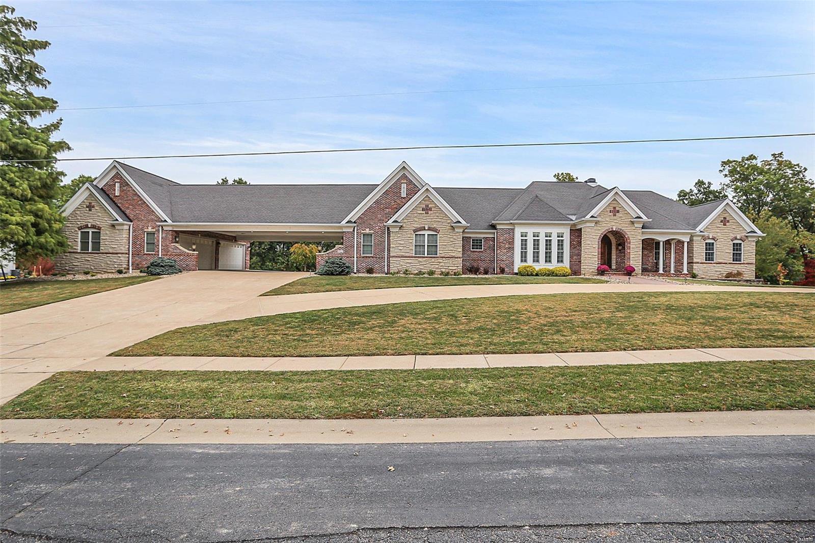 6300+sq/ft and 1.71 acre lot backing to Suson Park, 7-car heated garage adjoined by a porte-cochere. Rounded, stained glassed front door welcomes you to large foyer flanked by Office & Dining Rm fit for a King. Great Rm w/vaulted ceiling, Palladian windows & FP. Kitchen w/granite, island 60in wolf range, hood, and 48in SubZero. Adjoining Breakfast Rm w/open views of Hearth Rm w/built-ins & see-thru FP to vaulted Sunroom. Main Floor Master w/coffered ceiling, private balcony, W/I closet; Bath w/dble sink vanity, 6-head W/I shower & Whirlpool tub. Main Floor is completed w/en-suite Bd, Laundry Rm & Powder Rm. Open atrium staircase leads to W/O LL; find a Family Rm w/FP, custom bar which includes full Kitchen, dining area, Rec Rm, Game Rm, professional-grade Fitness Rm & additional full Bath. You’ll also find 2 en- suite Beds both w/walk-in closets & plenty of storage space. Large deck, enormous patio & fenced-in yard! This one's truly an amazing opportunity! Additional Rooms: Sun Room