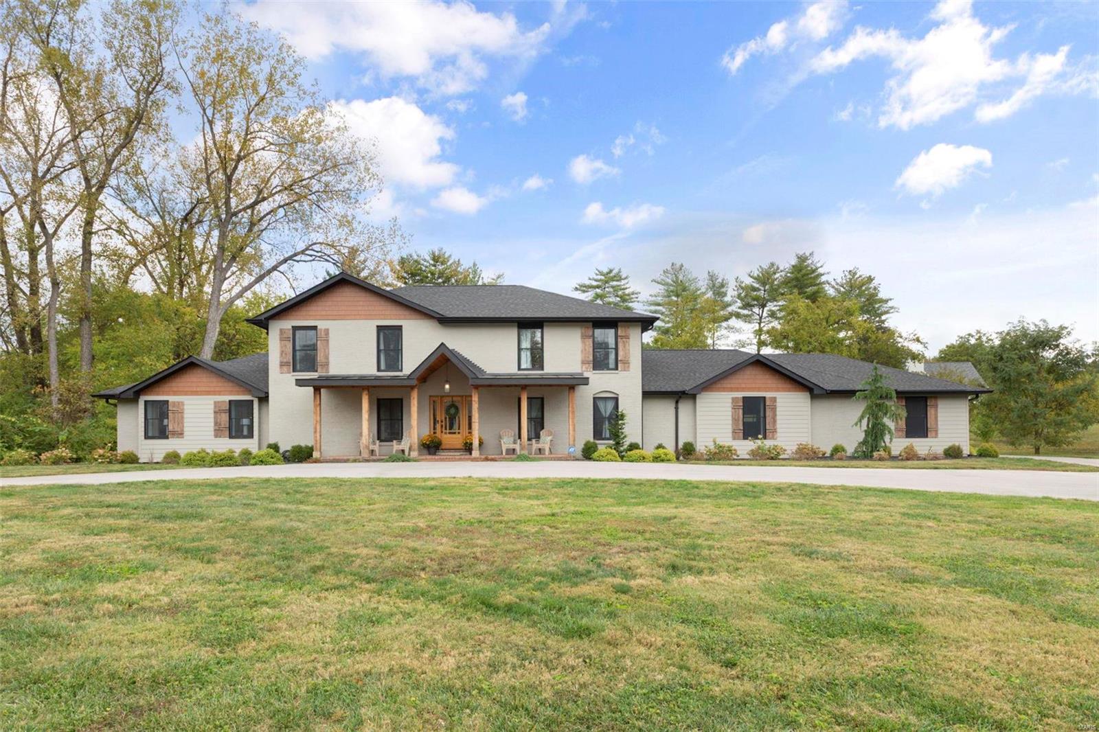NEW PRICE! Prepare to move into this turn-key home by Callahan Custom Homes! The rustic elevation and expansive circle driveway set the stage for the awe-inspiring beauty that awaits. Step inside and fall in love with the wide plank wood floors and timeless color scheme throughout. The large gourmet kitchen boasts custom cabinetry, high-end stainless steel appliances, quartz countertops, and an endless island, perfect for hosting holiday gatherings. The main floor master suite features a swoon-worthy closet and a luxurious bathroom with a custom tile shower, soaking tub, and large format tile flooring. Upstairs, another master suite awaits. Situated on a stunning acre lot in T&C. Countless updates have been made, resulting in a truly remarkable living experience. To finish it off, relax in your backyard with a new pool and fireplace area for the whole family to enjoy together. The backyard photos show you what the grass will look like filled in at the buyer's expense. Additional Rooms: Mud Room