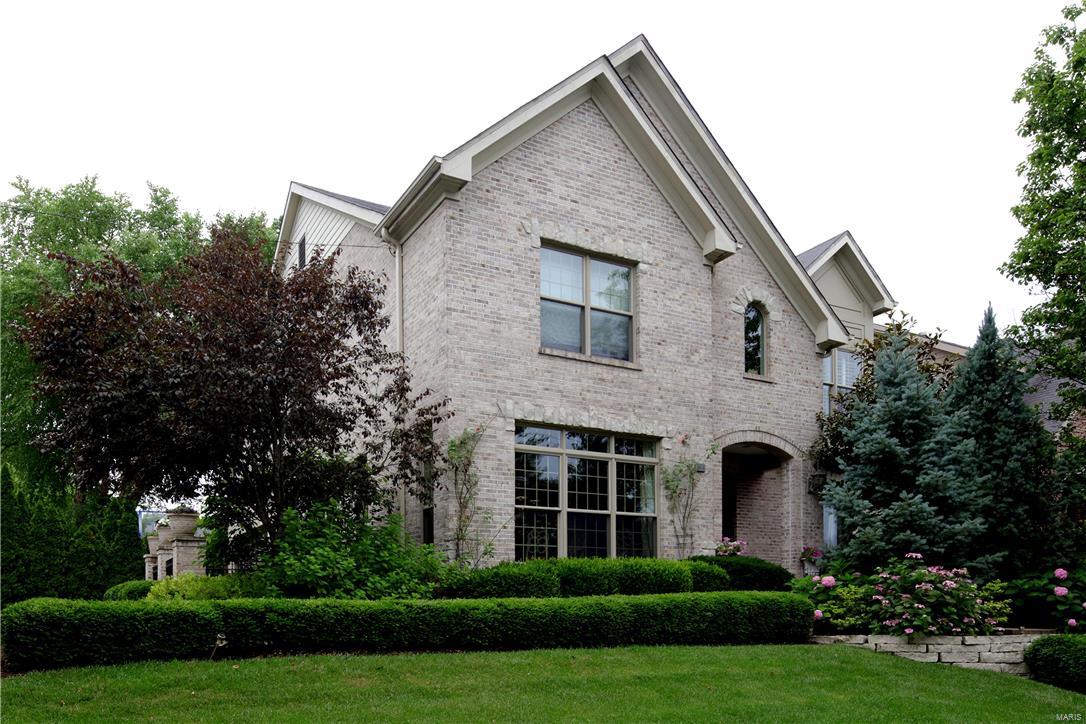 Custom Built home with exceptional designer decorating & extensive landscaping.  Entering you are greeted by a gorgeous foyer that leads to the stunning study with built-ins & private patio.  The sophisticated dining room is large & sun drenched with full length windows. Gourmet kitchen has granite counters, custom cabinetry, stainless appliances, breakfast bar, adjoining breakfast room & access to side patio for entertaining & outdoor grilling.  Expansive Great room features fire place, spectacular views of the private, lush landscaping & opens to ground level deck overlooking large, level, fenced yard. 1st floor wood floors are rich colored mocha stain. 2nd floor features luxurious master bedroom suite.  Master bathroom has been updated with new tile, glass shower enclosure & adjoins the 12 X 10 walk in closet. Bedrooms 2 & 3 are large and share a bath.  Bedroom 4 is a private Ensuite.  Lower level features family area with full wet bar, adjoining rec room, 5th bedroom and full bath.