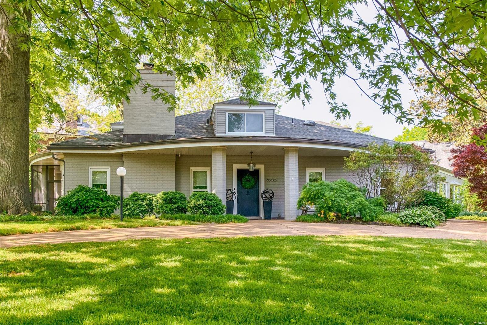 Sophisticated living in the heart of it all! The highly desirable Ellenwood neighborhood is walkable to the shops and restaurants on DeMun Ave (Louie’s, Sasha’s, and Kaldi’s Coffee to name a few) as well as Forest Park, Wash U, and Wilson, Forsyth, and St. Michaels Schools. This cool California-contemporary 1.5 story features a unique Palladian entry and stylish modern interior. High-end designer finishes throughout, including a massive quartz waterfall island, SubZero/Miele appliances, gold hardware, and distinctive light fixtures. Main level is comprised of living, dining, den/office, screened porch, eat-in kitchen, family room, laundry, 1/2 bath, Primary suite, and guest suite. Two additional bedrooms upstairs, spacious garage, large patio, and a bonus room perfect for hangout or workout space. The layout also makes it a great "right-size" home for low-maintenance living. Side driveway is not shared - parallel driveways that were poured at the same time.
