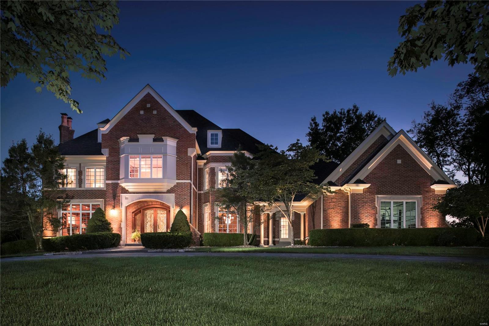 A majestic residence offering approx.7,300 sqft of total living area on a pastoral acre+ within a gated luxury enclave.The staged residence masterfully combines scale,refined finishes & amenities to reflect a well-lived life.All hardwood floors are now refinished & stained for beautiful continuity.The updated bespoke kitchen(painted lighter color 2020)now features custom wood cabinetry,sophisticated lighting,granite counters,Viking & SubZero appliances & a handsome hardwood fl extending to a regal hearth rm with 1 of this homes 5 fireplace's & vaulted wood ceiling.The luxurious Primary suite includes a sitting area,lavish en suite bath & a new closet as of 2020.Walk-out lower level includes entertaining space accented w/fireplace,wet bar,fitness rm,sauna,bath & additional gathering/game rm.The recently refinished pool,water feature,spa,fp & outdoor living area are bordered by professional landscaping.Other impressive features includes 4 car garage w/lift,newer roof &HVAC’s
