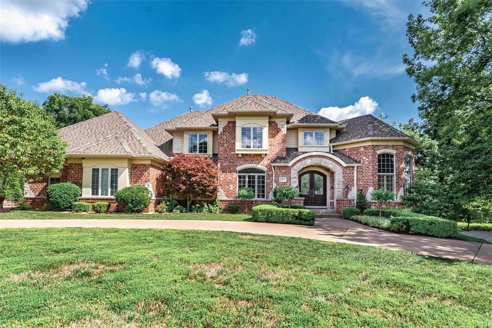 Custom Langeneckert 1.5 story, brick & limestone home on 1.29 acres w/ separate guest house overlooking a Dominci Tricamo designed pool/built in spa and a private wine cellar w/ mahogany doors & double barreled arched ceiling that holds 2,500 bottles  behind glass doors w/ natural cork floors! One of a kind property, Newer roof, 2 new HVAC units all w/i the last 2 years. Sellers have spared no expense updating the home w/ beautiful hickory floors, all interior walls & trim have been completely refinished, beautiful plantation shutters added t/o along w/ a complete kitchen makeover. Kitchen cabinets were refaced & newer top of the line appliances added w/ beautiful granite counters. You'll love the octagon office, detailed mill work t/o, high ceilings & expansive windows. Fin. walk-out LL w/ 2nd kitchen, family rm, guest rm, exercise rm & wine rm. Gorgeous grounds w/ terraced gardens, tiered waterfall, wooden footbridge & a beautiful path to private gazebo. Circle drive/3 car garage Additional Rooms: Wine Cellar