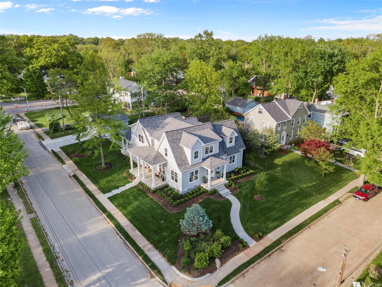 If you live near the heart of Kirkwood you've likely watched the complete transformation of this home over the past year. It was doubled in size and is now nearly a brand new, light-filled happy home that exudes perfection throughout! It's also located in one of the most coveted neighborhoods in Kirkwood just a few blocks from all the downtown amenities. A traditional exterior showcases three covered porches including one that overlooks Jefferson Ave. This is just a sampling of what awaits you inside this showplace home. The main level has 10' ceilings throughout highlighting the stunning kitchen & breakfast room, an open great room overlooking the patio and fire pit, a primary suite with soaring vaulted/beamed ceilings, and both a main & 2nd floor laundry. Upstairs are 3 additional bedrooms and a loft with views of the surrounding neighborhood. There's also a new completely finished lower level w/ 9' ceilings, a wet bar, and an office, bedroom and bath. (Buyer walked for no reason)! Additional Rooms: Mud Room