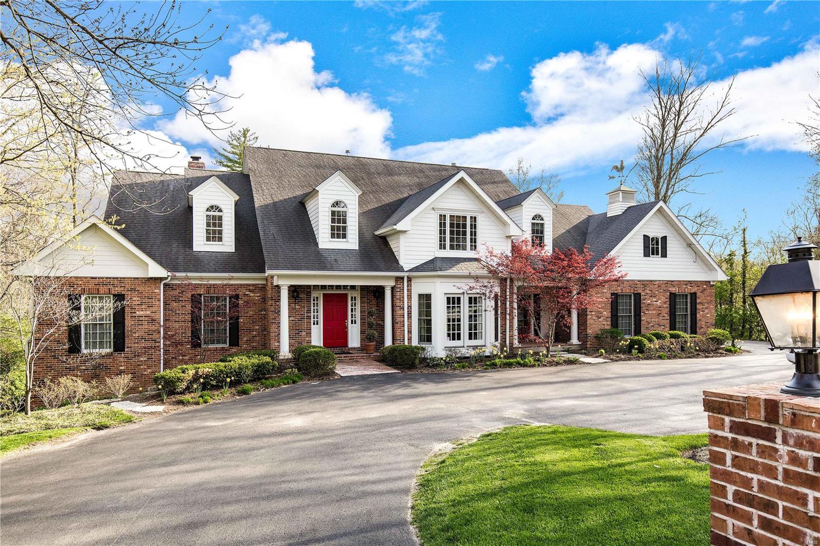 This elegant home boasts 5+ beds and 6 baths w/ hardwood floors throughout the main floor, 9-foot ceilings, some crown molding, custom mill work and an open floor plan. Dream kitchen w/ granite counter tops, center island, custom 42” cabinets. Equipped w/ a large Viking stove, Subzero refrigerator and breakfast area that opens to LR. LR has custom book shelves, marble surrounded fireplace w/French doors leading out to the patio, fire pit and pool area.  The hearth room off the kitchen features knotty pine walls, beam ceiling and fireplace with stone surround also opening to the patio/pool. Exquisite main floor master looks out to the private pool. Large walk in closet, luxury bath w/ granite counter tops, double sinks, separate shower & soaking bath. Upstairs you will find 3 over sized bedrooms & 2 full baths. Upscale finished LL w/ large rec room, newer fitness room, wet bar & 2 add'l bedrooms.  Private tree lined backyard w/ a stone patio and pebble tec pool to enjoy all summer long!
