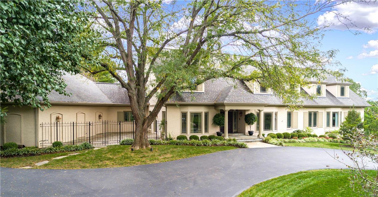 Through a complete rehab of both style and structure this elegant 1.5 story home will accommodate any style of living. An abundance of architectural details are immediately evident throughout the home with unique ceiling configurations, window selections and lighting tailored to each space. The open floor plan flows beautifully for entertaining and day to day living. Picture perfect kitchen, hearth room, living, dining, and sun rm all include the quality features you expect along with some you don't, just too many to list so be sure to see the brochure with detailed room by room features. Master suite, 2 more bedroom suites and laundry round out the 6500sqft main level. The 2nd flr includes office space/study area, 2 bedrms with Jack and Jill bath, guest suite and laundry closet.  The lower level offers 2000+sqft with game rm, full kitchen, hearth rm, sitting rm, study area, fitness rm, full bath and changing area for the pebble tec pool. Intricate alarm system, 3 car garage and more. Additional Rooms: Mud Room