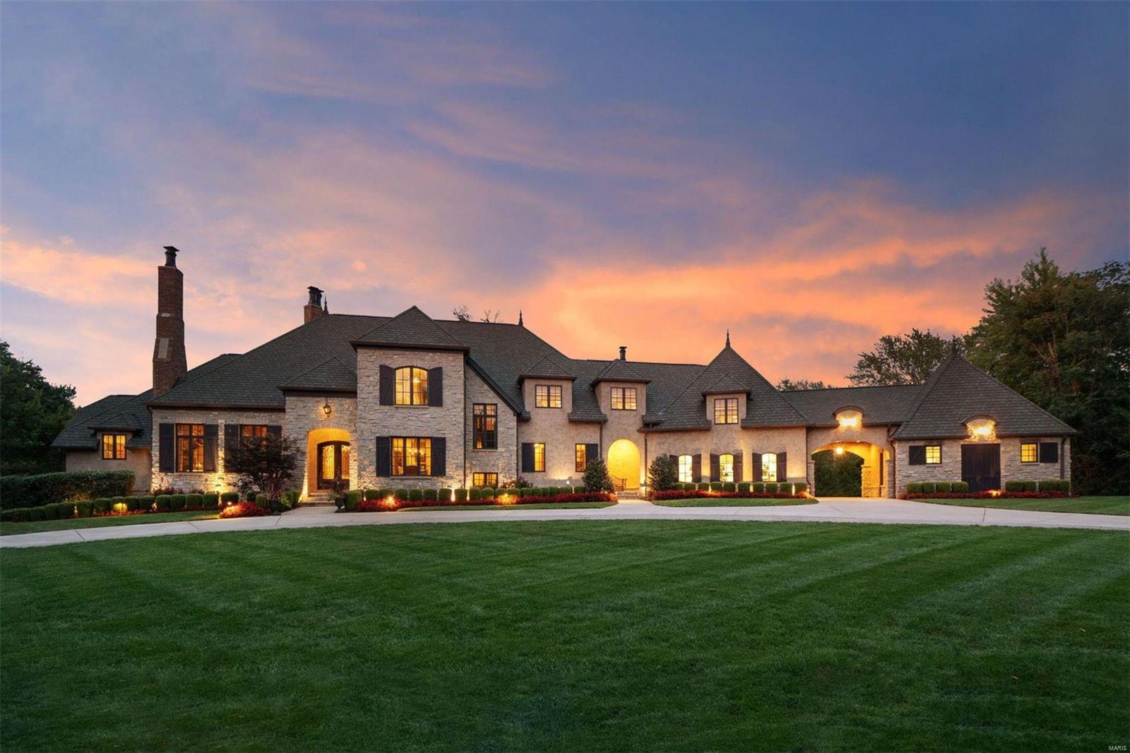 Incredible French manor -10 Vandiver Lane is one of 3 custom-built homes in a private enclave situated on 1.4 acres exemplifies quality throughout.12ft+ ceilings on 1st fl, cypress harwd flrs & Venetian plaster are a few of home's features. Foyer opens to DR, library/office w/ full masonry stone FP & the FM w/built in bar & French doors opens to outdoor living w/ FP, grill, & views of salt water pool. Kitchen -2 islands w/ 2 SubZero refrig/freezer,Wolf appliances,double-oven,6-burner stovetop,& an adjoined HR w/ stone FP. 1st-flr mudroom- laundry room, powder room, cubbies leads to 4 car garage, a porte-cochere. MF master suite,custom dual closets,coffee bar & vaulted ceilings, large walk-in shower & separate air tub.2nd fl- 3 bedroom suites,w/ walk-in closets/study room. Finished walkout LL- a fantastic gym, a rec rm w/  built-in TV, stone floors, and see-through gas stone FP connects to the game room w/ bar that seats six. Full bath w/steam,steam shower and dressing area. A must see! Additional Rooms: Mud Room, Wine Cellar