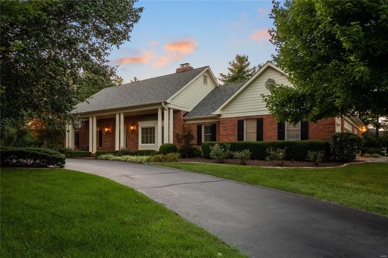 Stunning home on an exceptional acre lot in Town and Country! Understated classic taste is exemplified throughout this meticulously maintained & renovated home. 5 beds & 5 full/2 half baths w/ a Master suite & 2nd bed on main floor. Rich espresso wide plank hardwood flooring is throughout main floor. Exceptional kitchen w/ crisp white custom cabinets, gorgeous granite tops, oversized center island & Thermador appliances w/ warming drawer & wine cooler complete this gourmet kitchen! A tranquil sunroom has wall of glass opening to back terrace w/ oversized pool & area for entertaining. Tall beamed ceiling & marble surround fireplace define the spectacular Great Rm. Main floor has a living rm which opens to the dining rm, main floor laundry & mud rm w/ 4 car garage. Every inch of this home has been redone w/ highest level of workmanship! Upstairs offers 3 beds, 2 bonus rms w/ skylights-perfect for office/ playroom, plus 2 new full baths. LL family room & half bath are ready to enjoy!